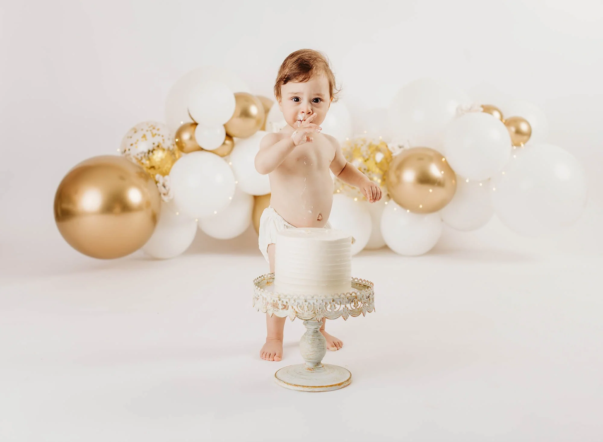 1 year birthday portrait, little girl, balloons, cake smash
