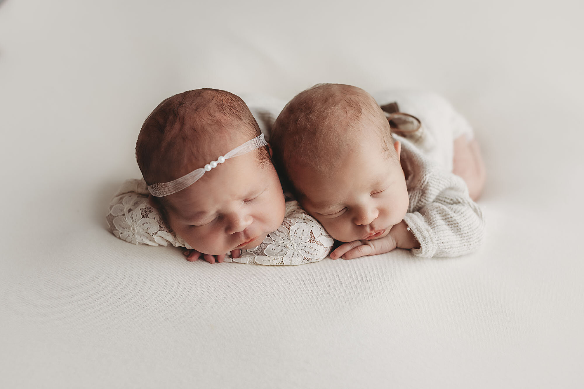 best newborn photographer daniela dagostino milton halton toronto twins laying side by side