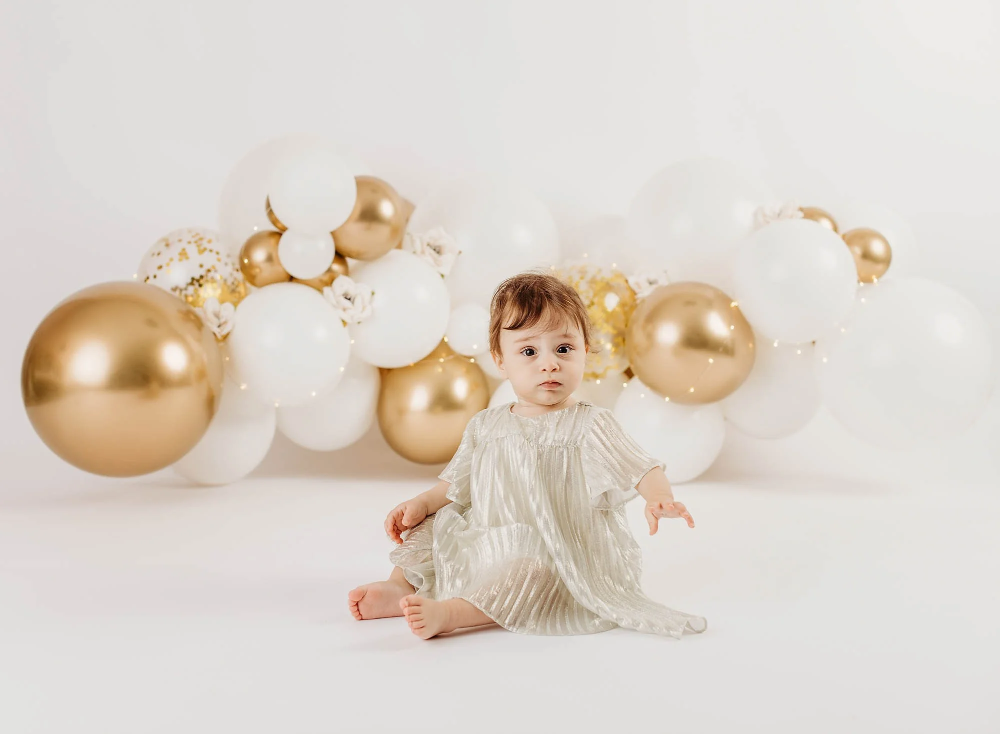 1 year birthday portrait, little girl, balloons, cake smash