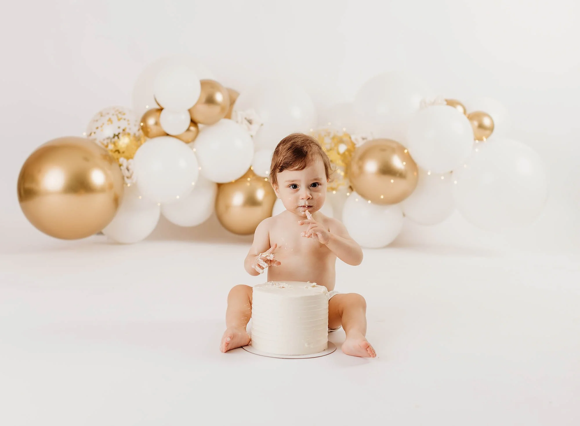 1 year birthday portrait, little girl, balloons, cake smash