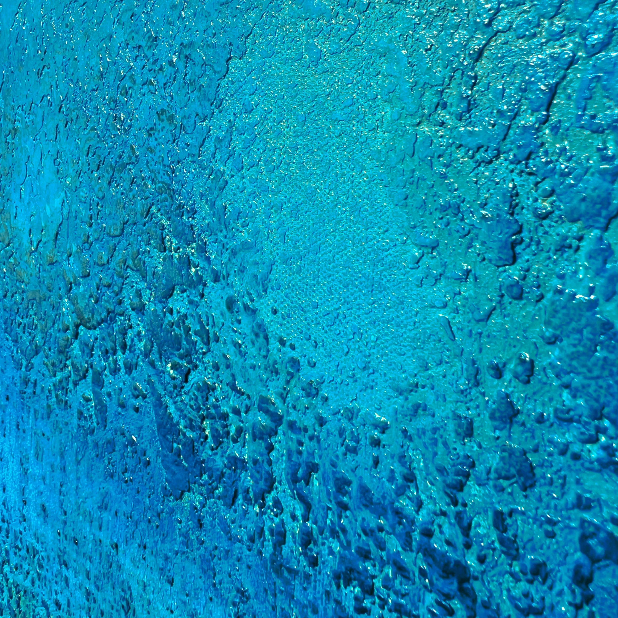 "Pacific": photo taken in natural daylight during the morning, two meters away from a skylight in partly cloudy conditions.