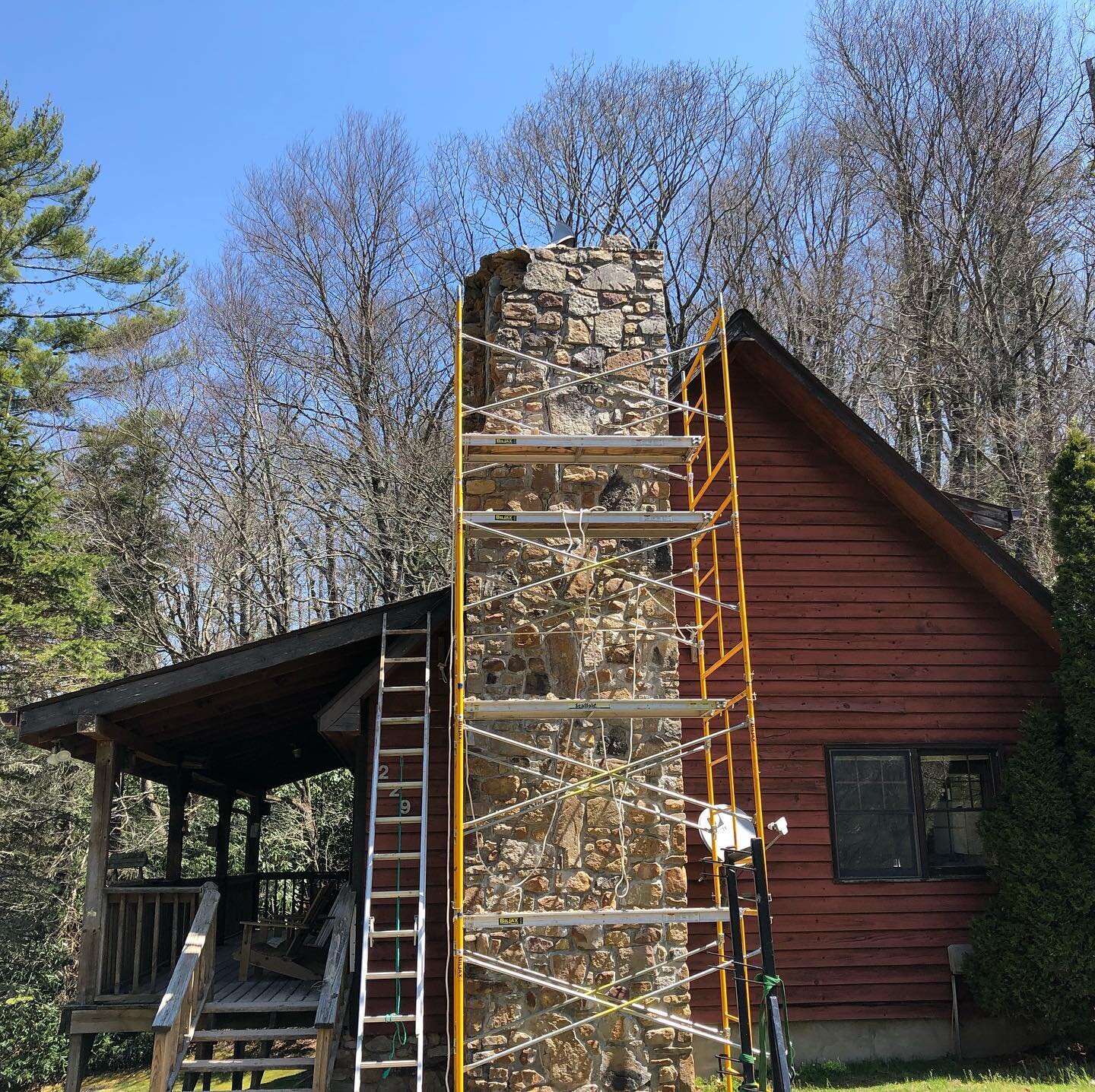 Getting some much needed repair work done on our beautiful chimney. Had some major cracks and a few missing stones from the rough weather over the years. Bringing this beauty back to life! #theblowingrockcabin