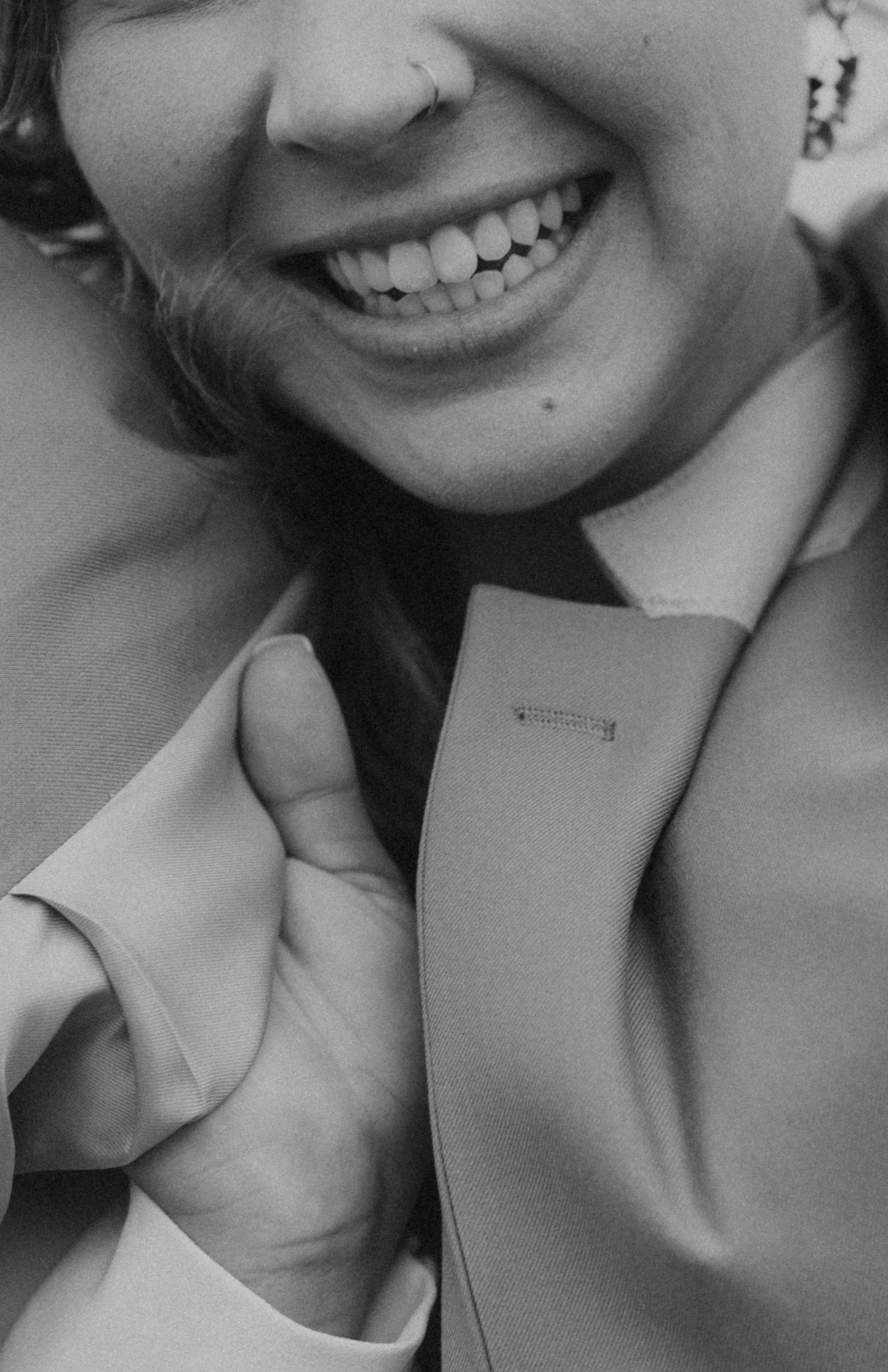 Bride wearing embroidered floral veil and hiking boots on Roan Mountain