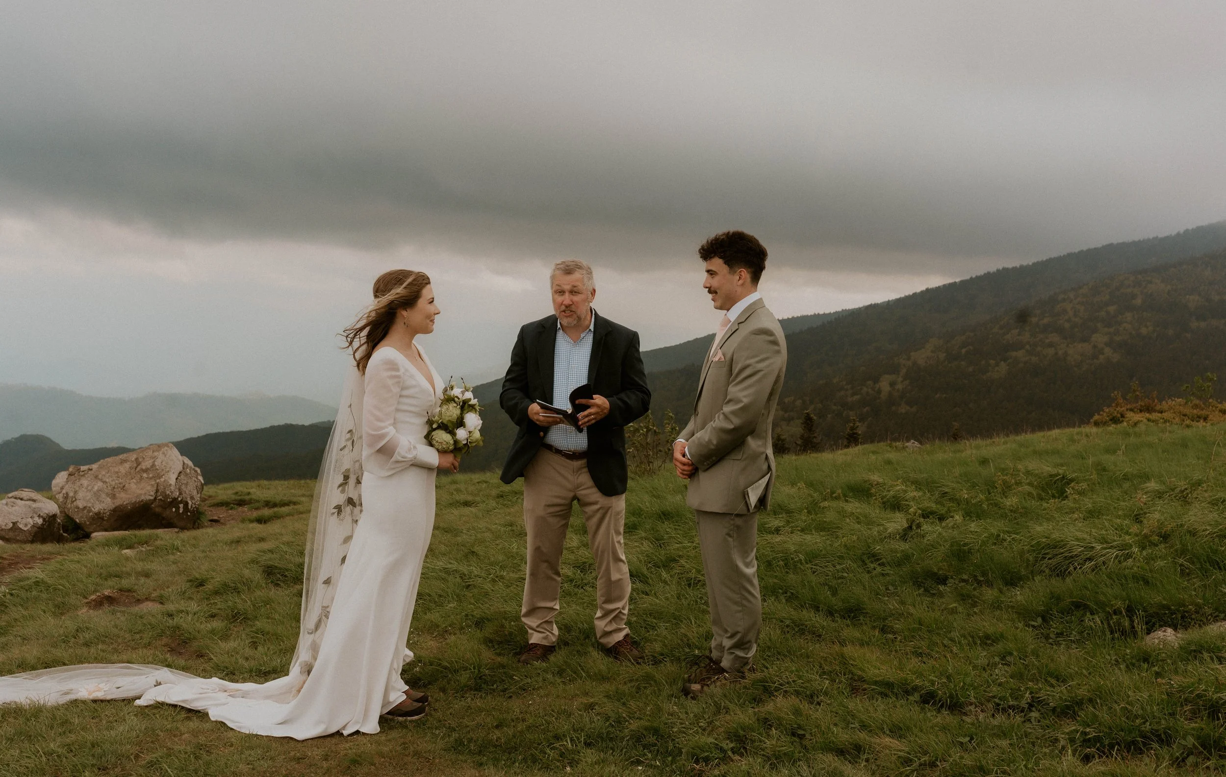Rainy Appalachian mountain wedding with emotional vows