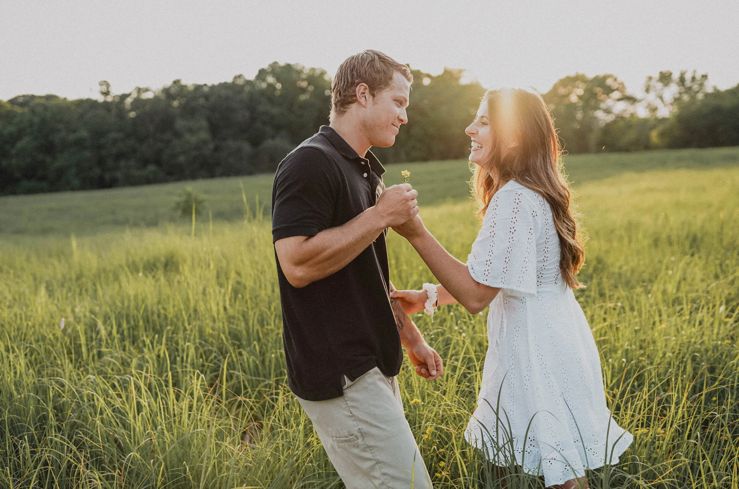 couple dancing during their engagement photo session in Asheville, NC