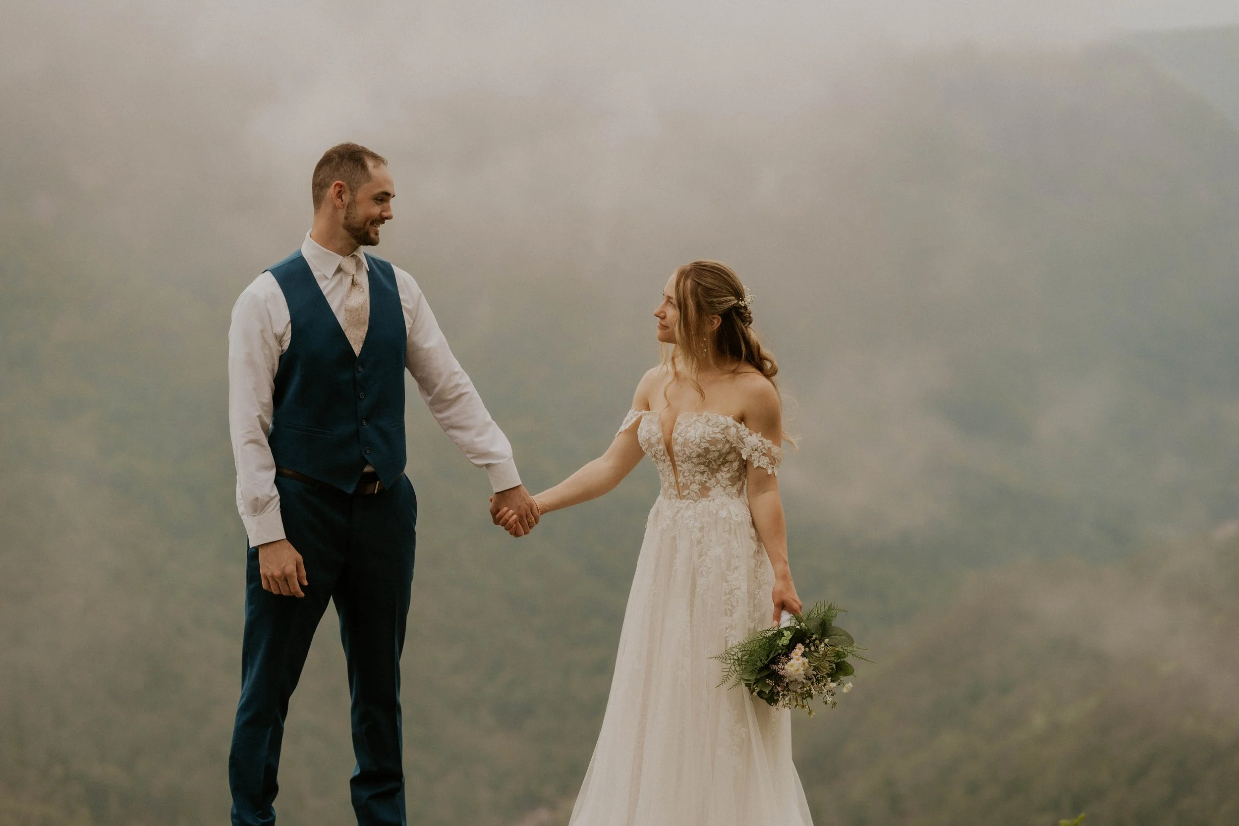 Just married couple soaking in the moment at Wiseman’s View overlook