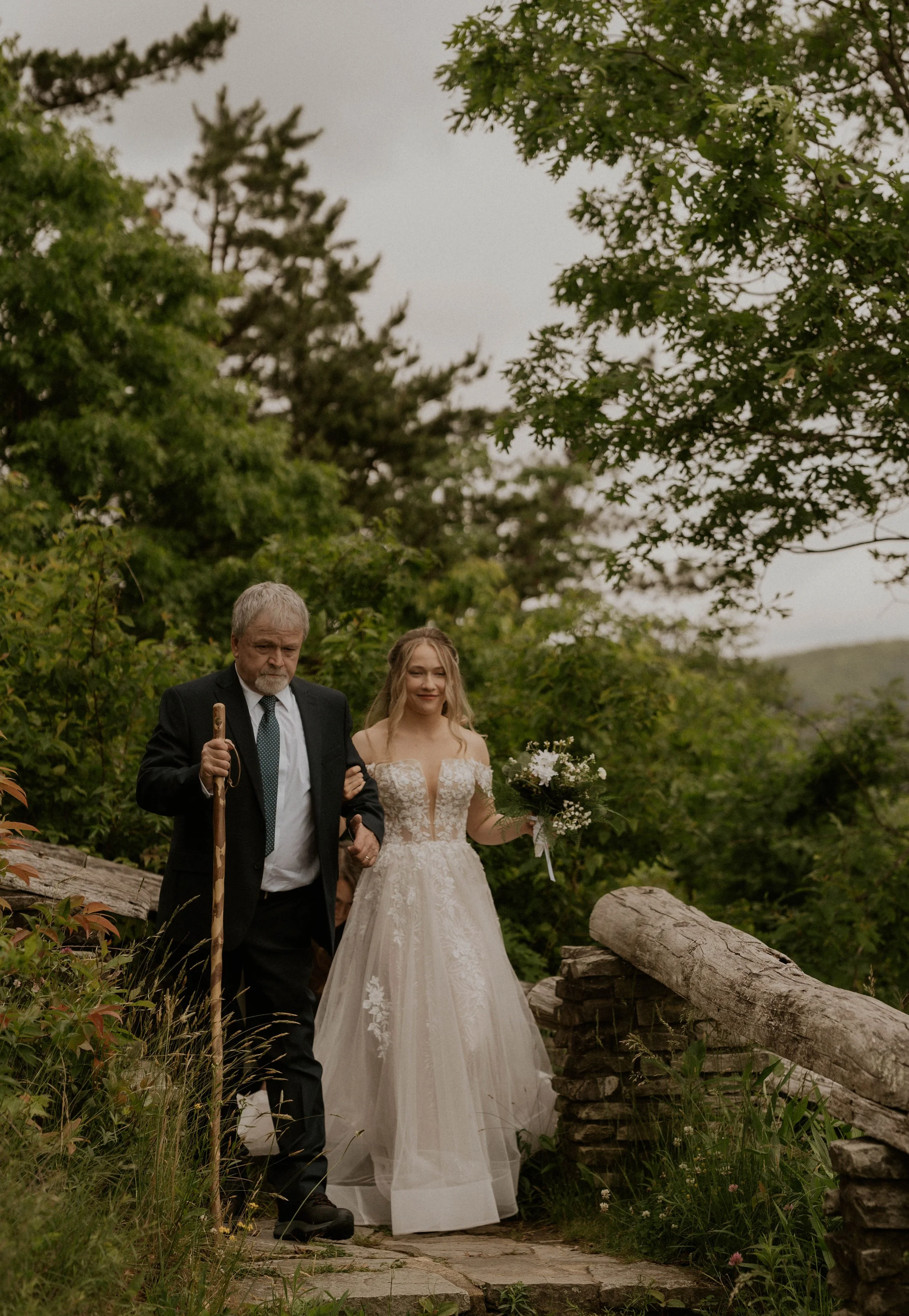 Bride walking down the path at Wiseman’s View elopement in Boone NC