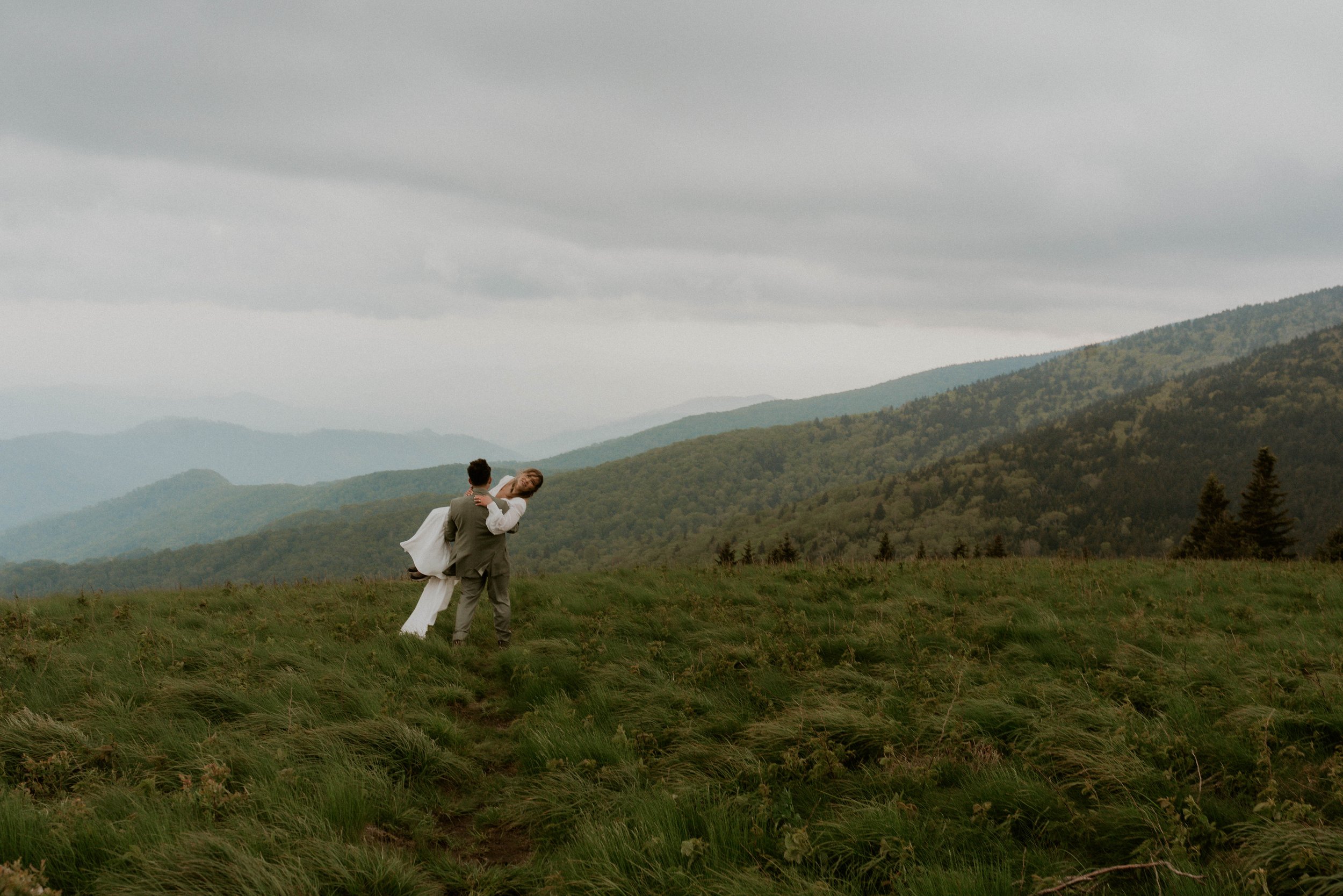 Rainy Appalachian mountain wedding with emotional vow