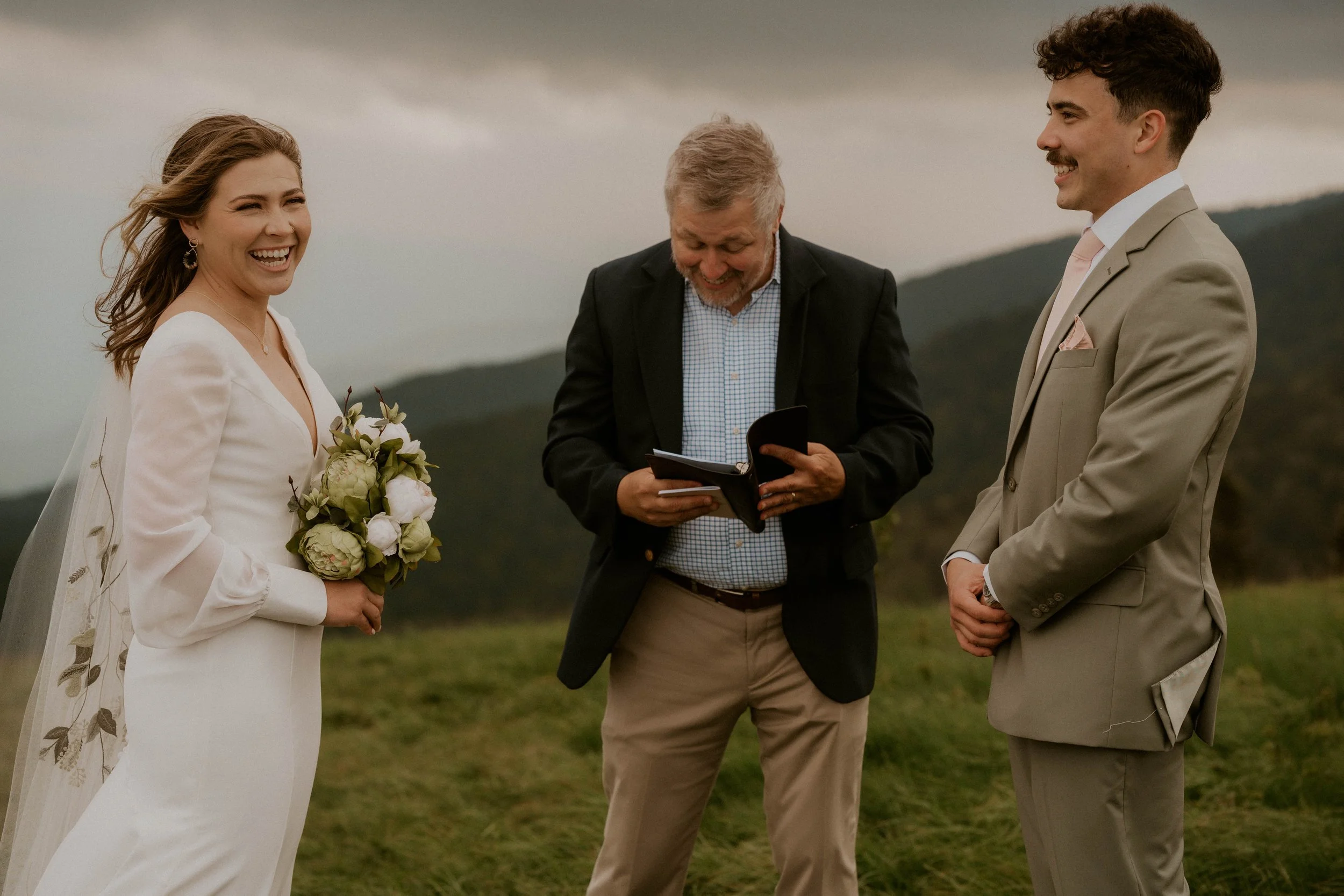 Rainy Appalachian mountain wedding with emotional vows