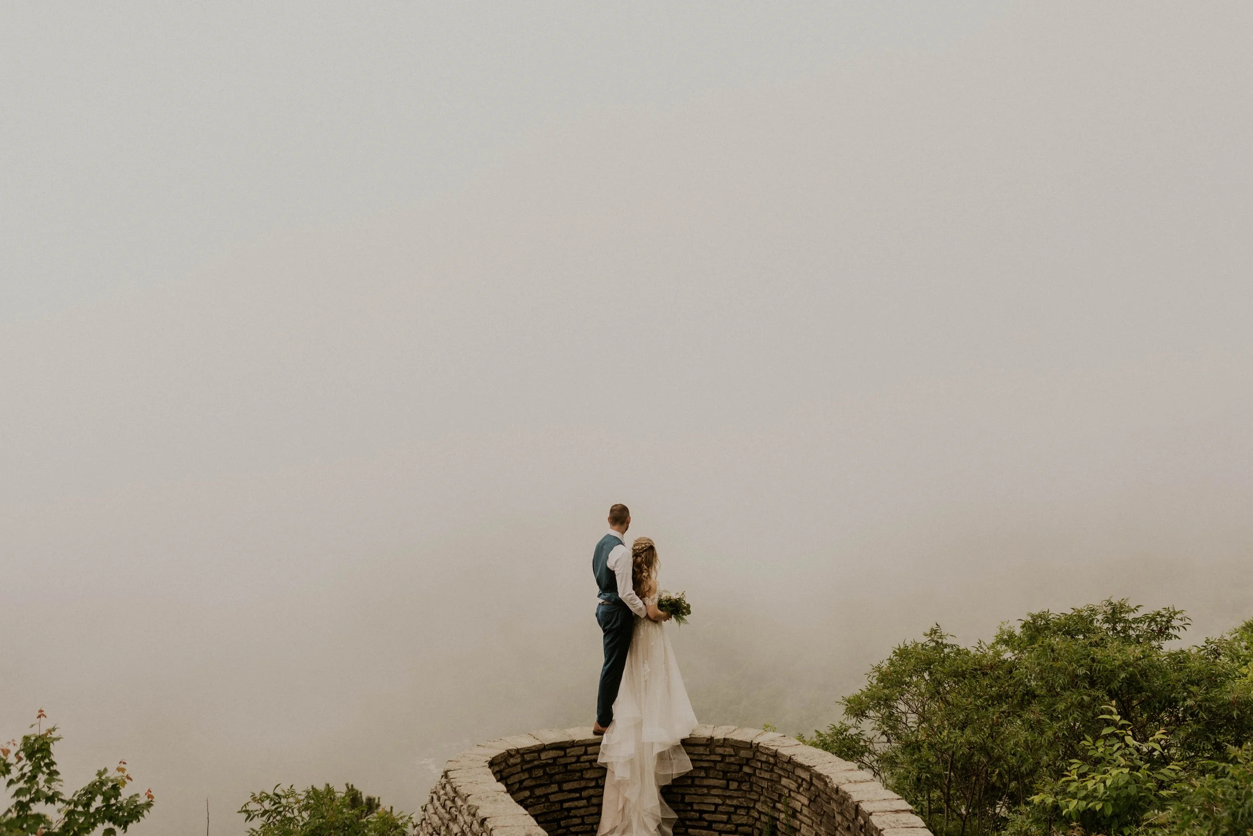 Just married couple soaking in the moment at Wiseman’s View overlook
