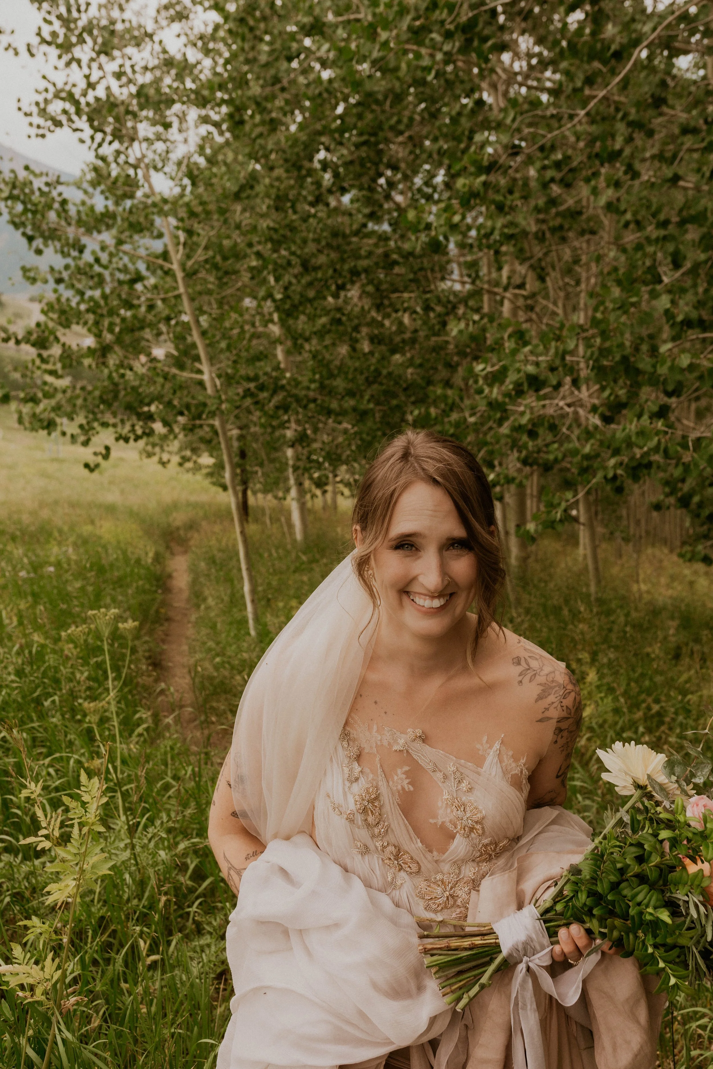 Couple hiking to their first look during a Crested Butte mountain elopement