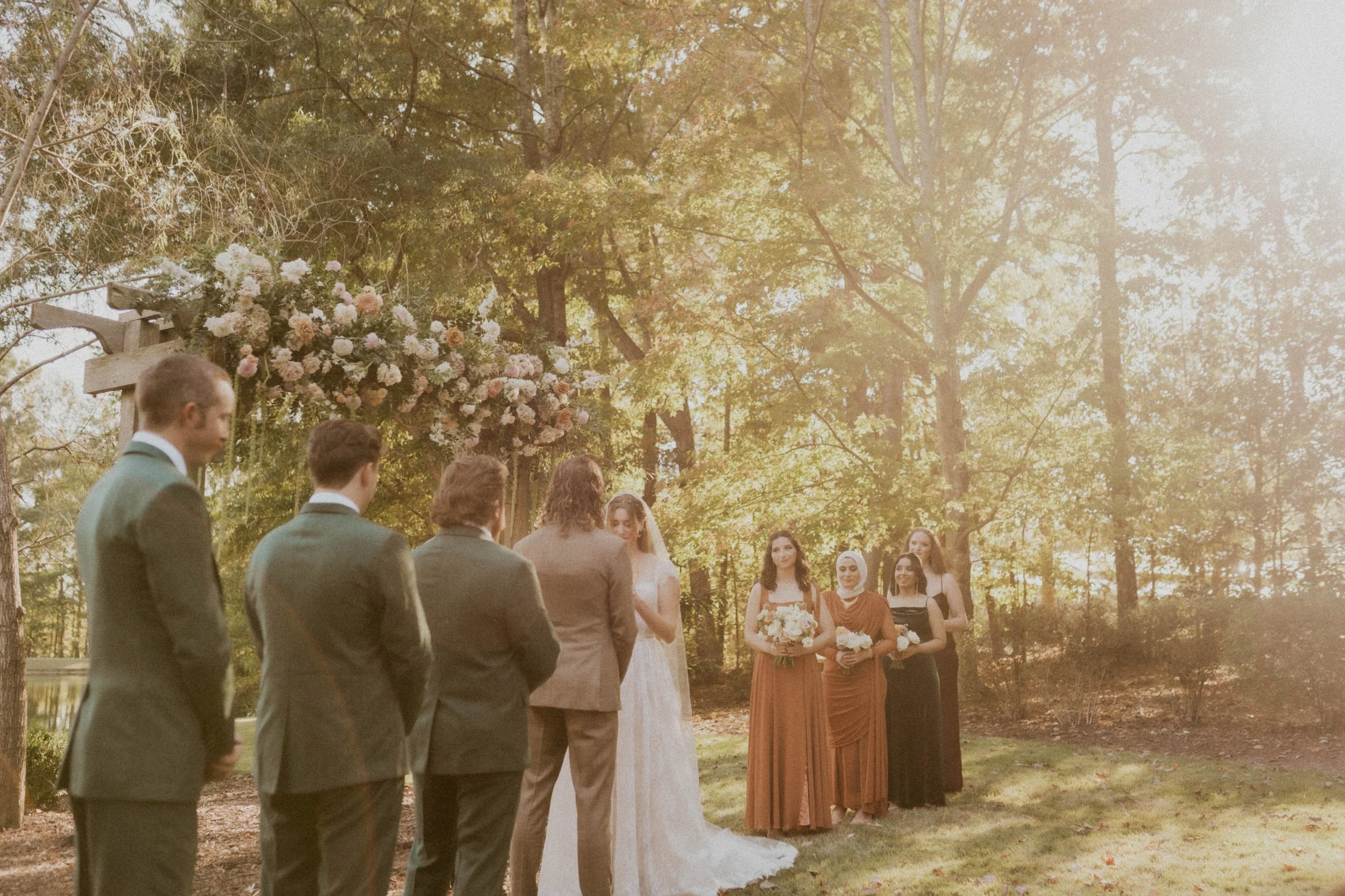 Bride and groom exchanging handwritten vows at an intimate Raleigh wedding