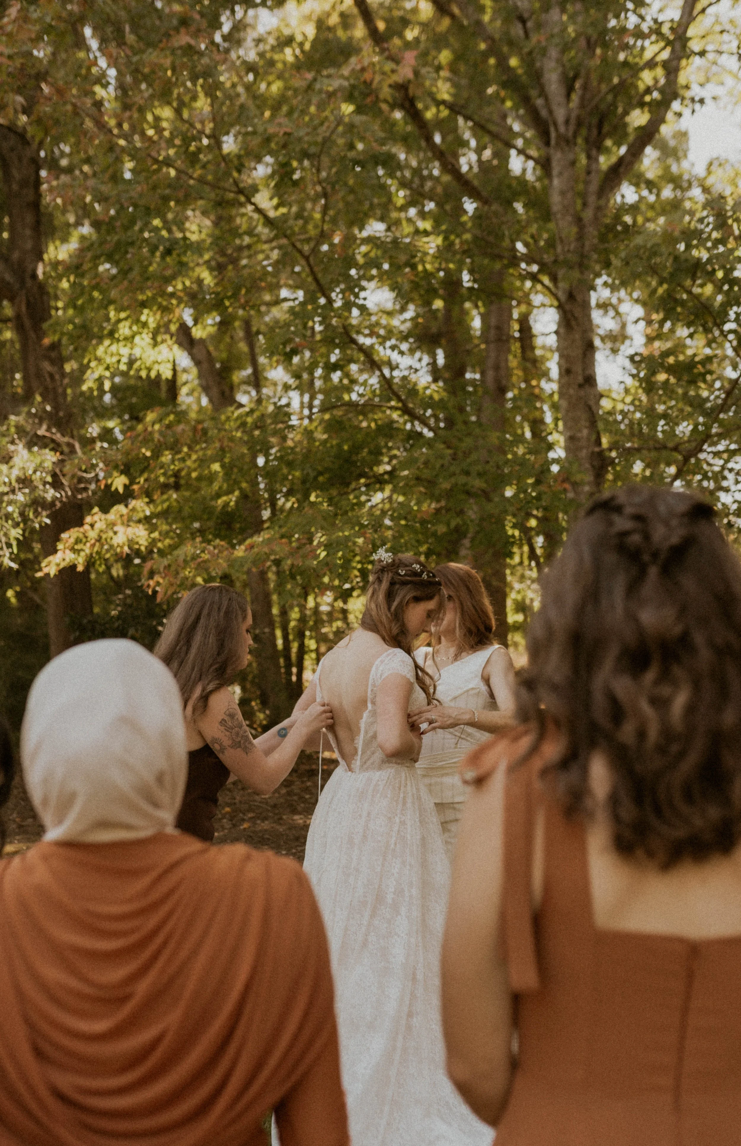 Bride getting ready with friends during a Durham NC wedding