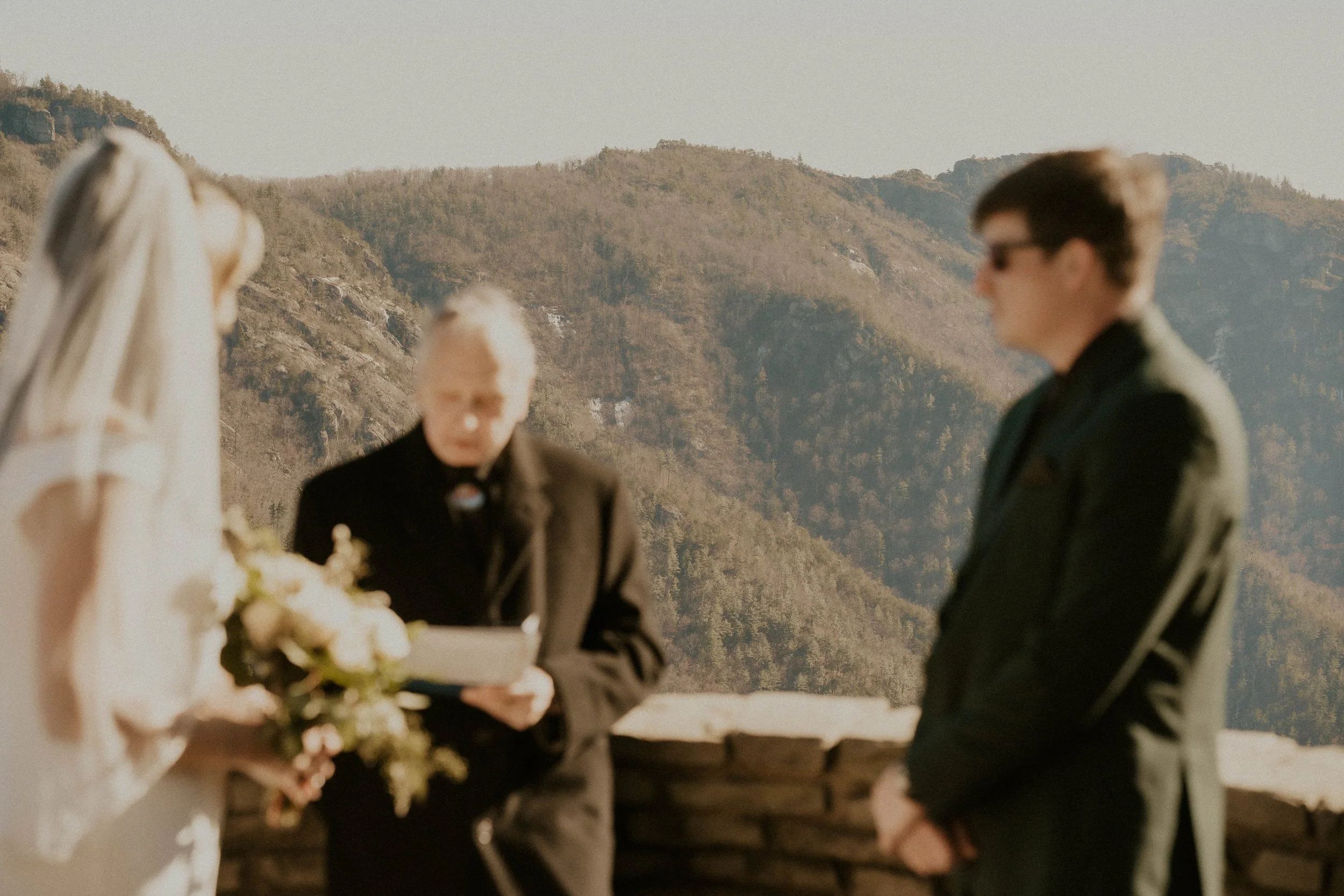 Emotional vow exchange during Asheville elopement with family