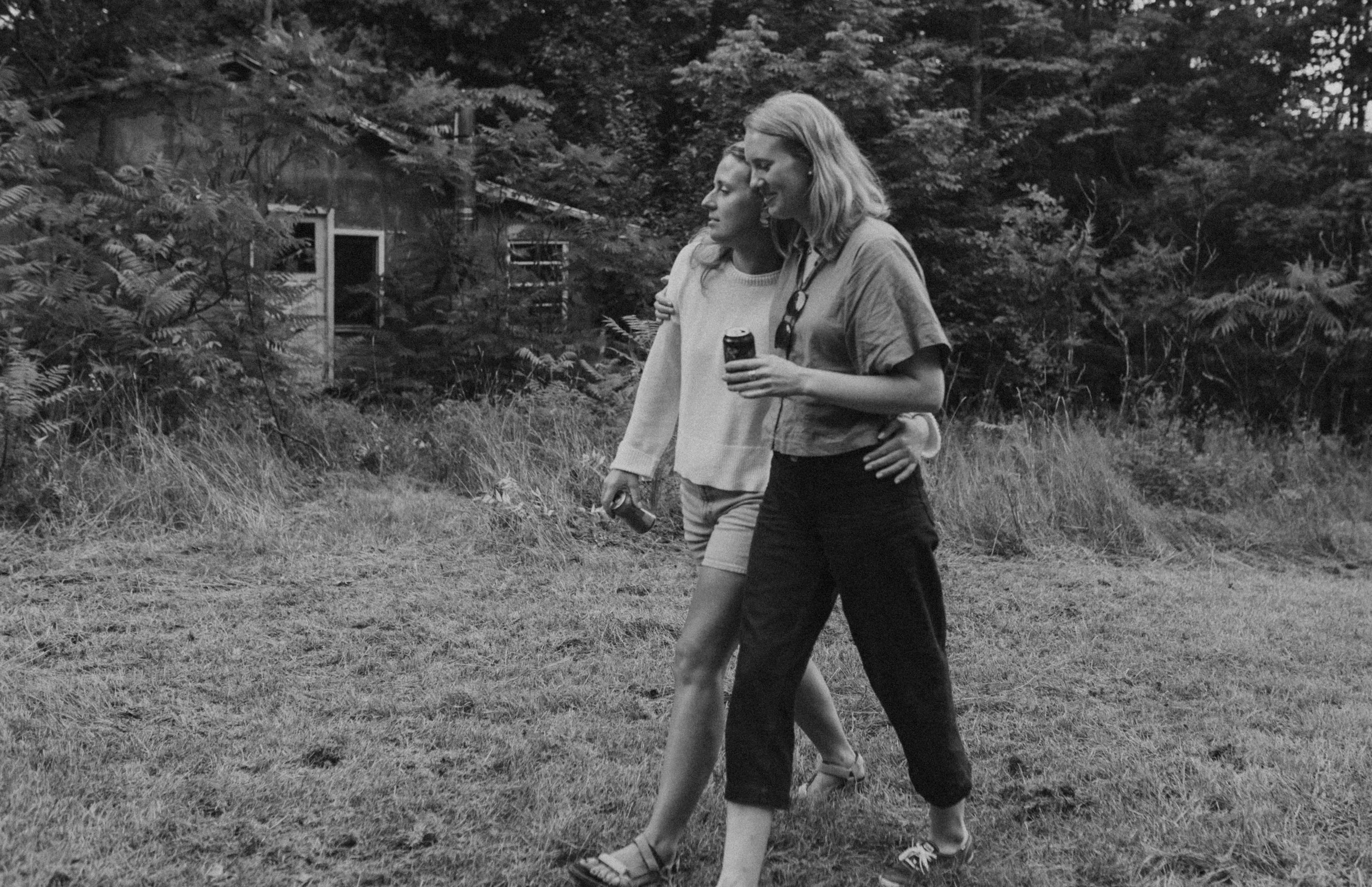 A candid, documentary-style photograph capturing an unscripted moment during an intimate North Carolina wedding.