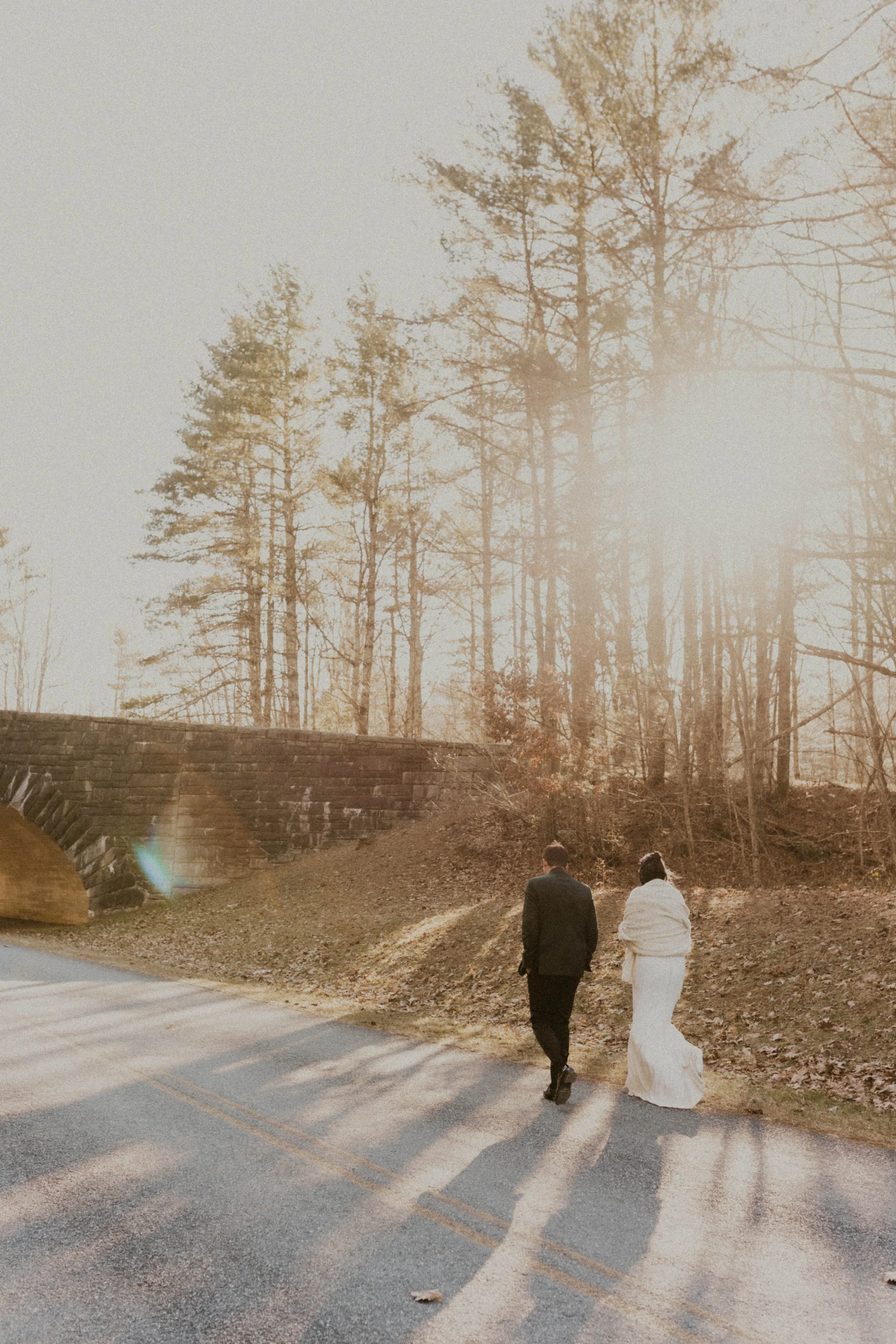 Couple leaving Wiseman’s View after their Asheville elopement ceremony