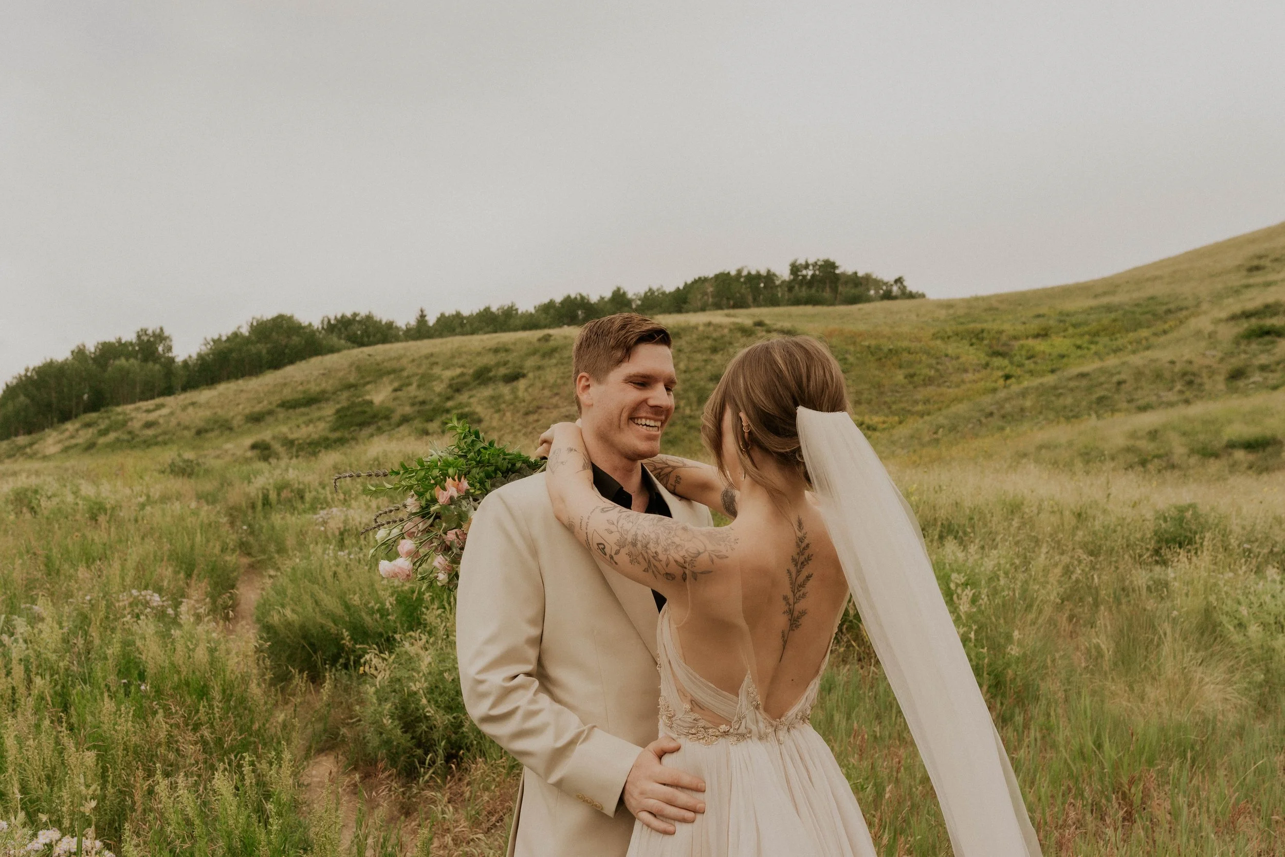Intimate mountain first look with wildflowers and aspen trees in Colorado