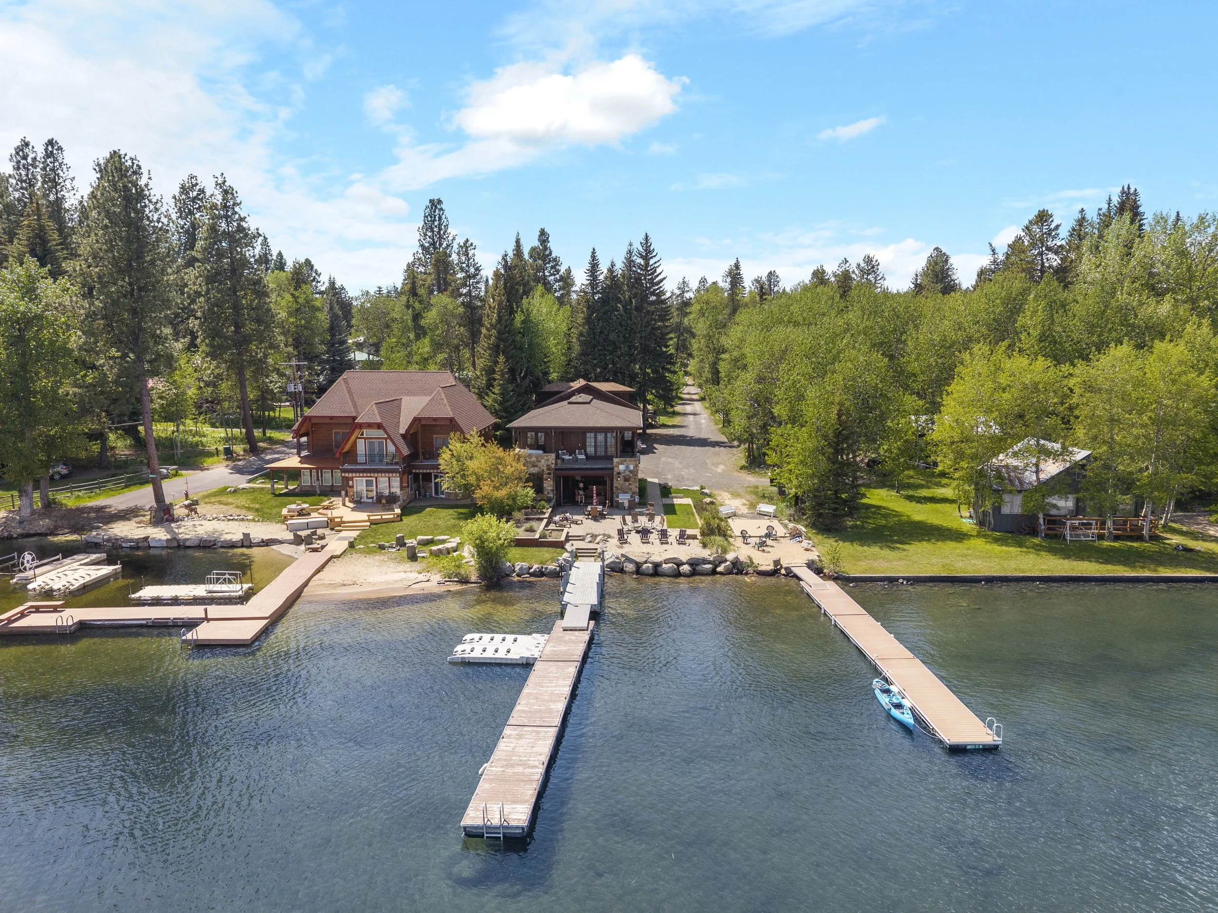 Aerial drone photo of a lakeside luxury rental on Lake Payette near Shore Lodge, McCall