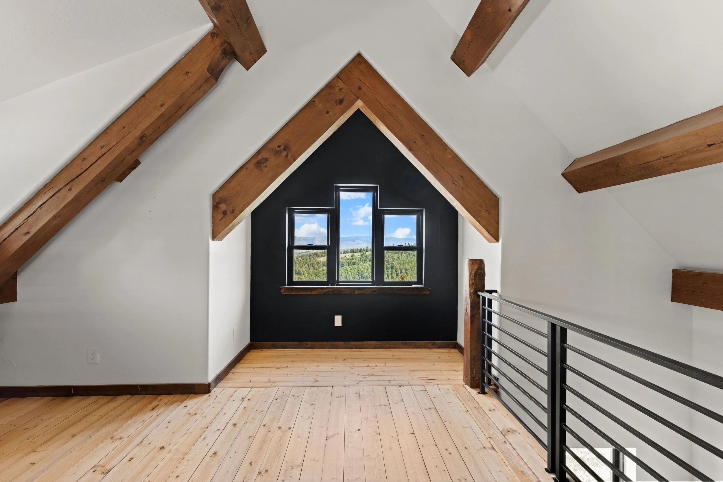 Attic with dormer window and exposed beams - GloHo Real Estate Photography