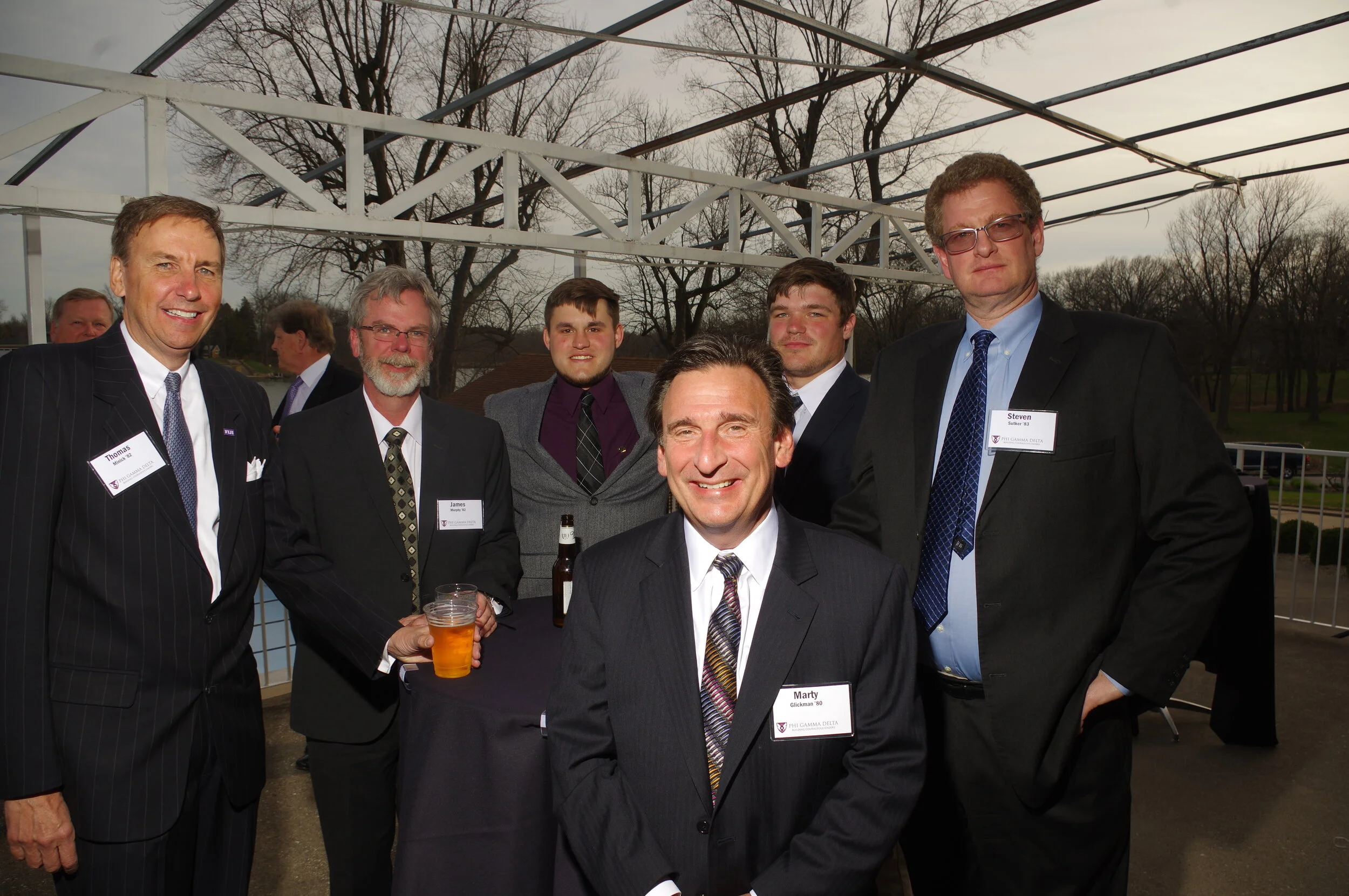 A pair of undergrads joins grads from the early 1980s.JPG