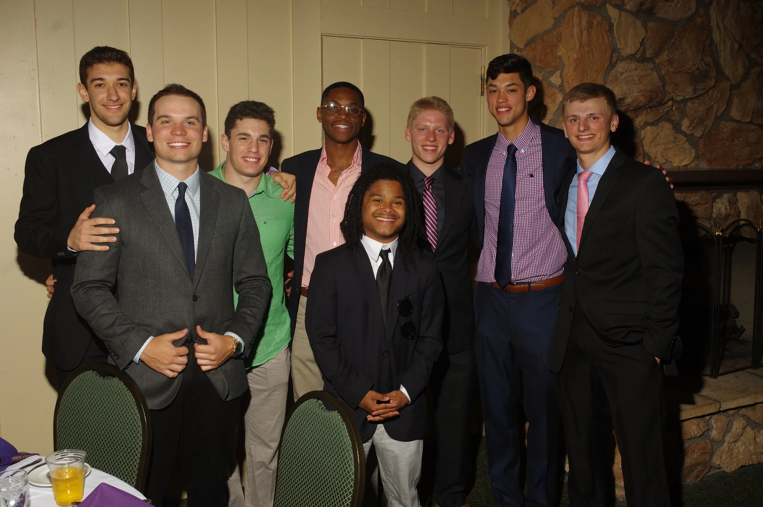 A group of current undergrad members poses at the banquet.JPG