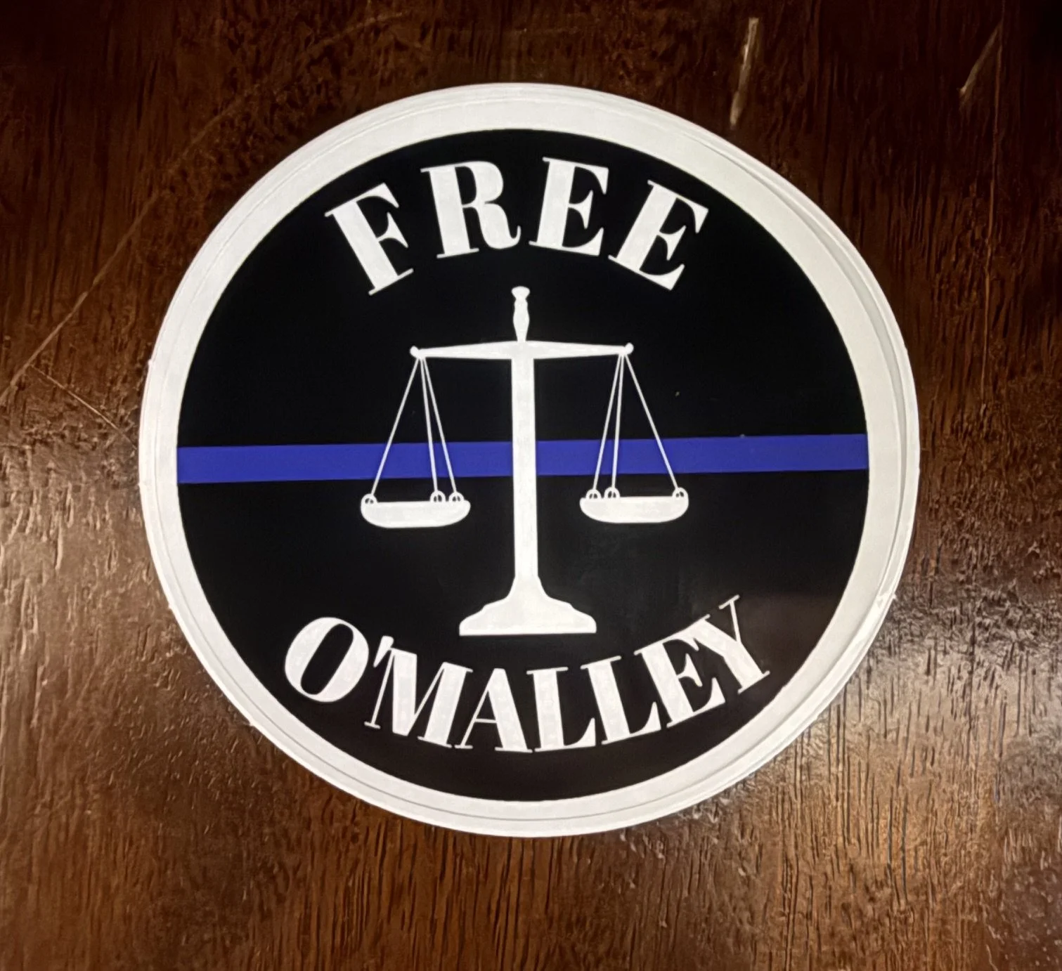 Free O'Malley 3” x 3” Circle Sticker
