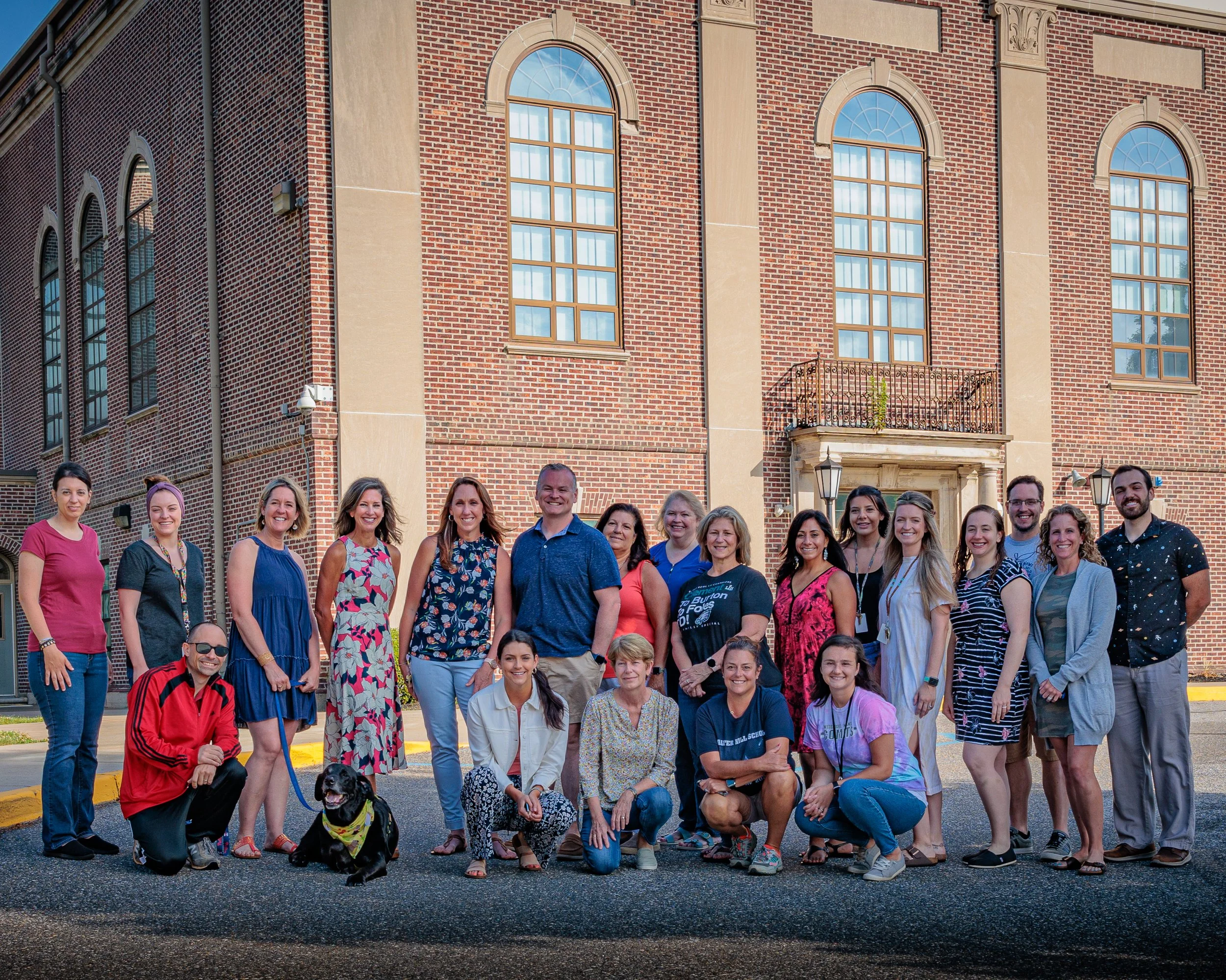 Large group portrait of teachers and staff outside the historic Walter Hill School building photographed in Swedesboro, NJ by Digital Imageries Photography.