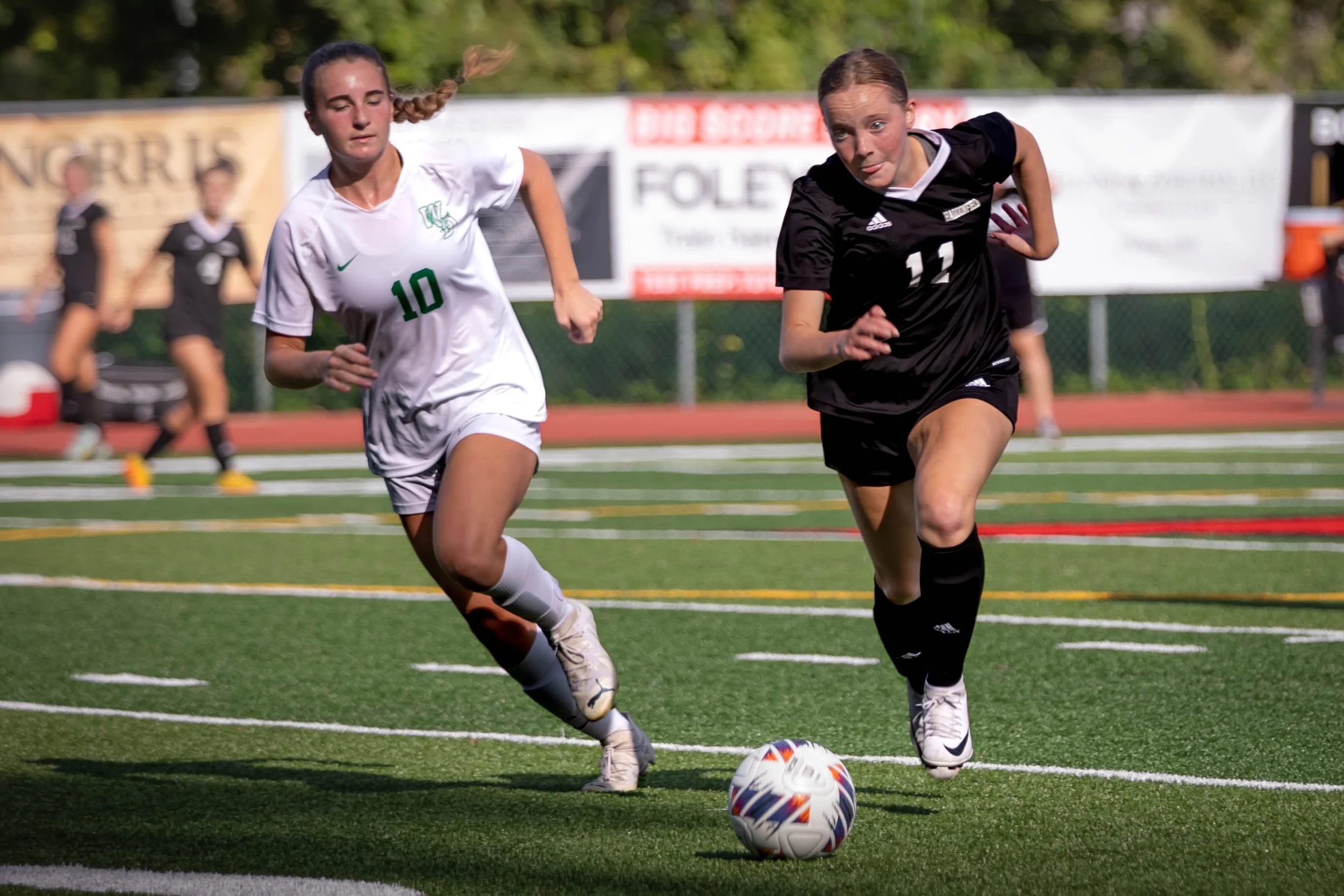 Intense game-day action from a Haddonfield, NJ high school soccer rivalry match.