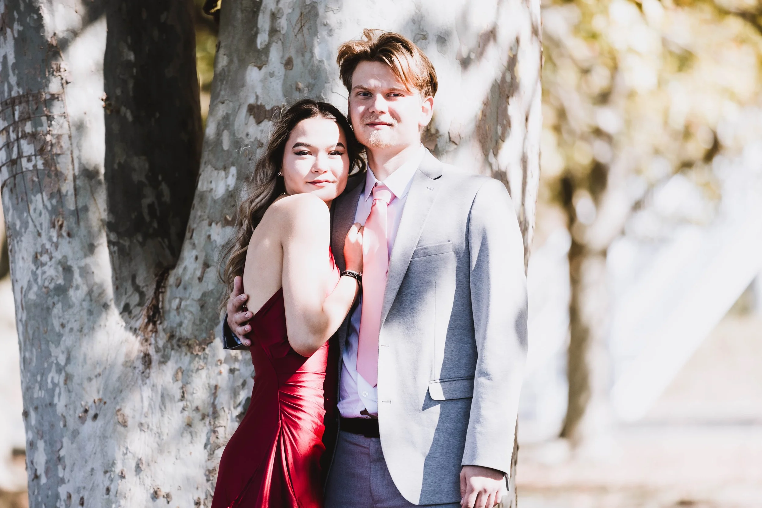 Outdoor engagement-style portrait of a couple in formal attire photographed at Red Bank Battlefield in National Park, NJ by Digital Imageries Photography.