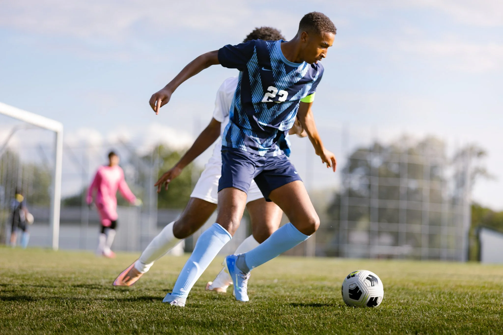 A Highland Regional midfielder controls the ball during a varsity soccer scrimmage against Glassboro in Gloucester County, NJ.