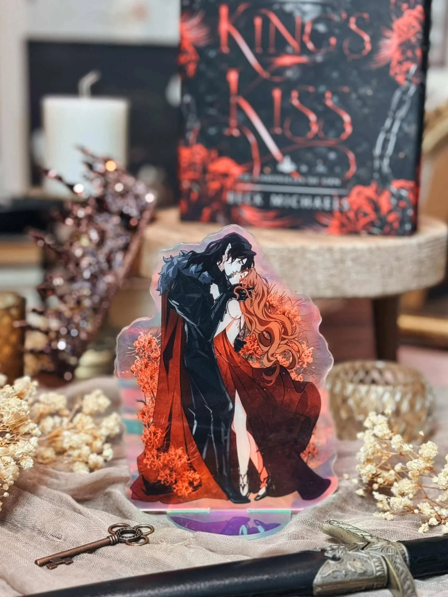 They’ve arrived… and they’re glorious. 👑✨
Meet the King’s Bride and King’s Kiss acrylic standees — 7 inches of pure fantasy magic, shining with a rainbow finish that catches the light like starlit glass.
These