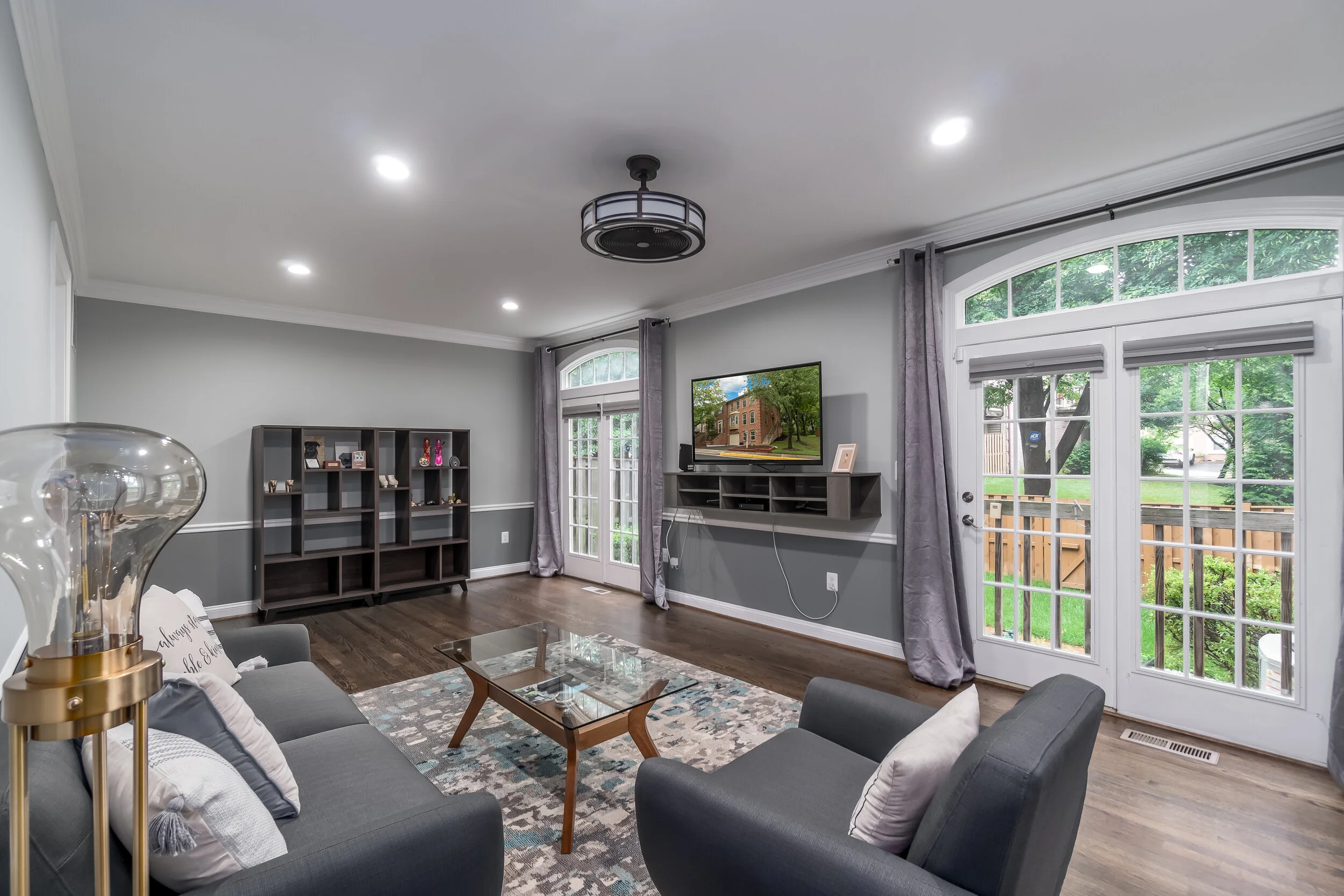 Watch the big game with friends and family in this lovely living room which expands out onto the deck and yard.