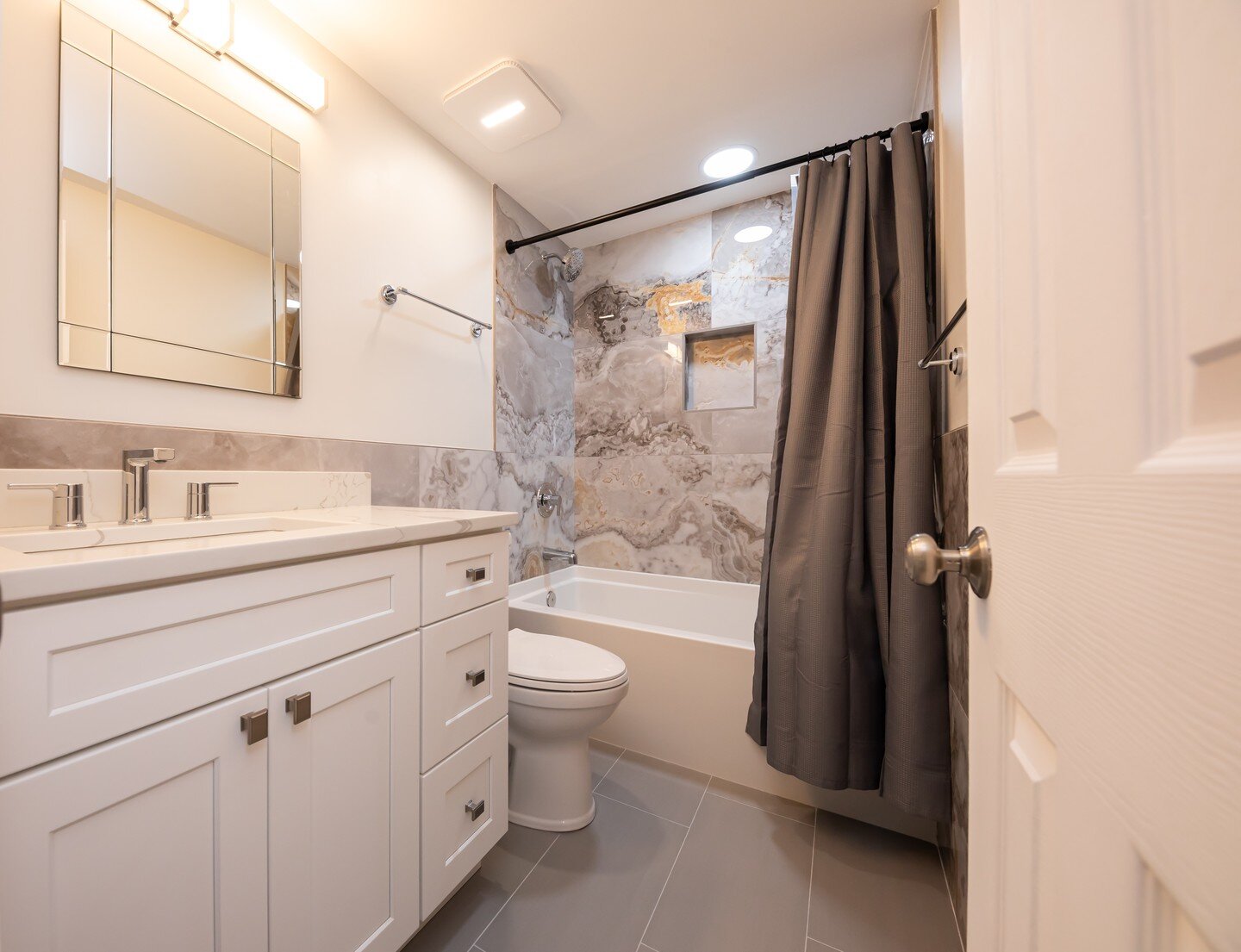 Check out these great new shots from our professional photographer! This bathroom is absolutely stunning. Everything, including the phenomenal wall tiling, is done in house by our wonderful staff at J &amp; M. Enjoy these pictures! If you like what y