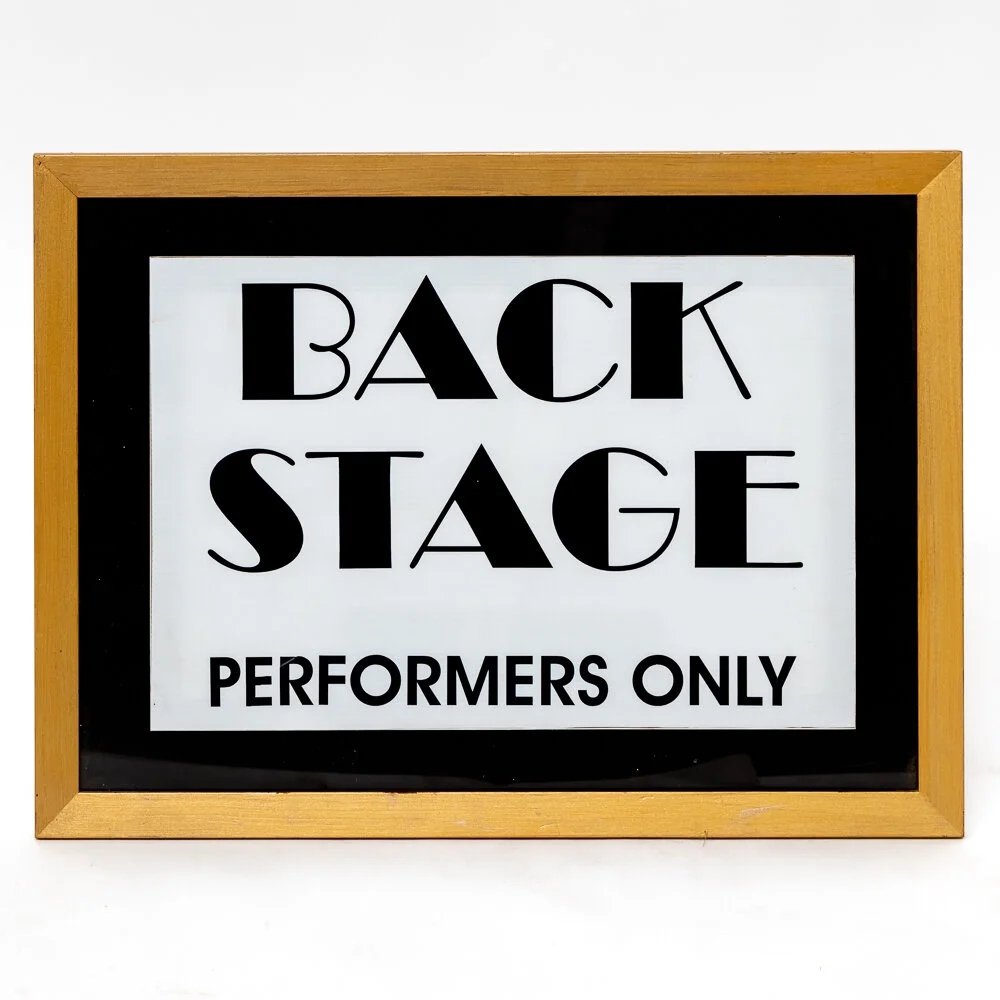 Back stage sign