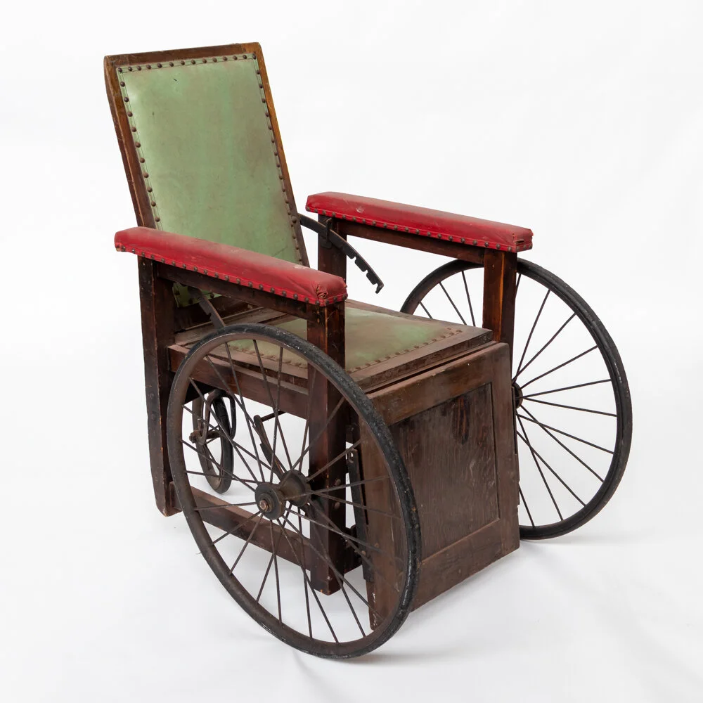 Antique wheel chair - Green leather