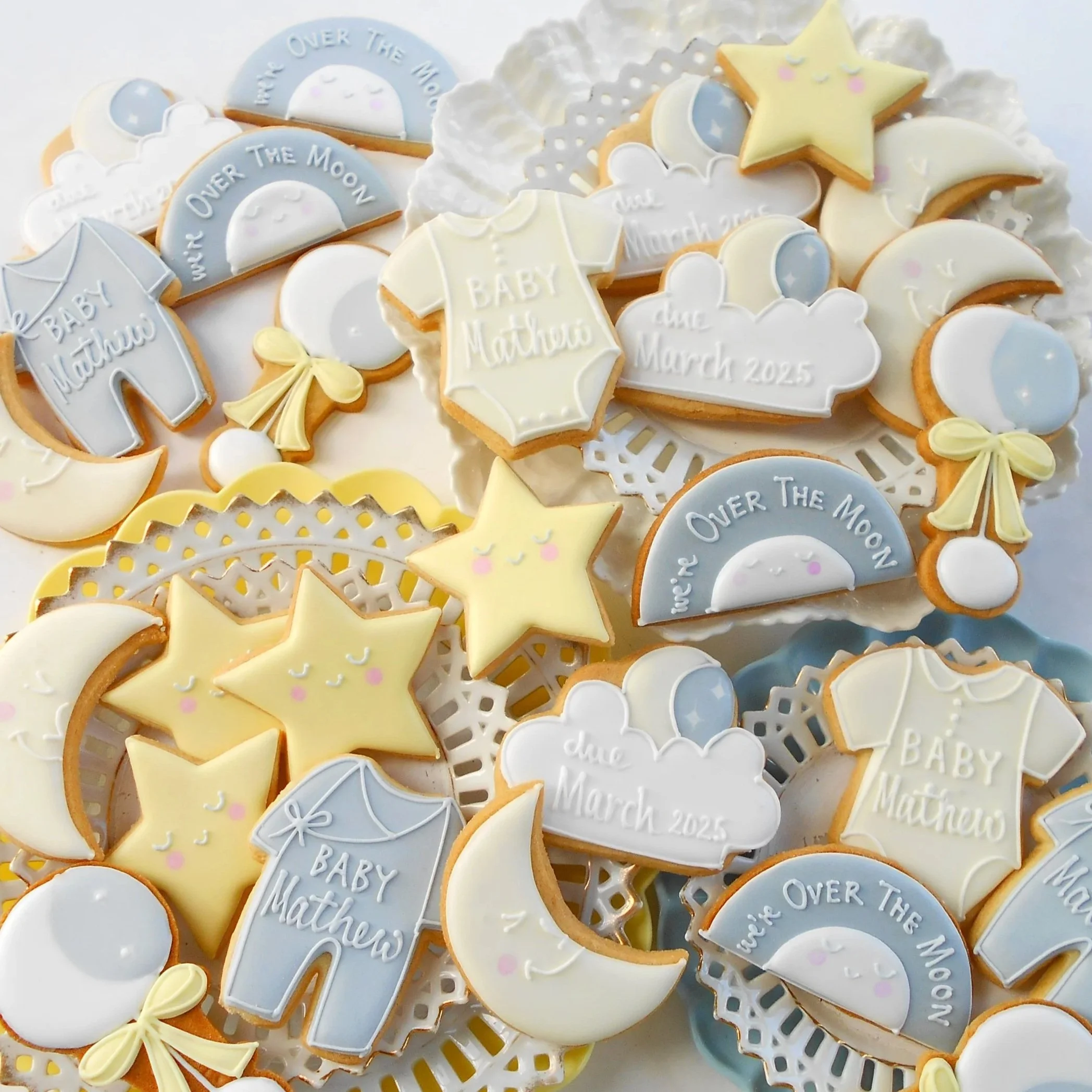 Over The Moon Baby Shower biscuits by TAKE THE BISCUIT UK