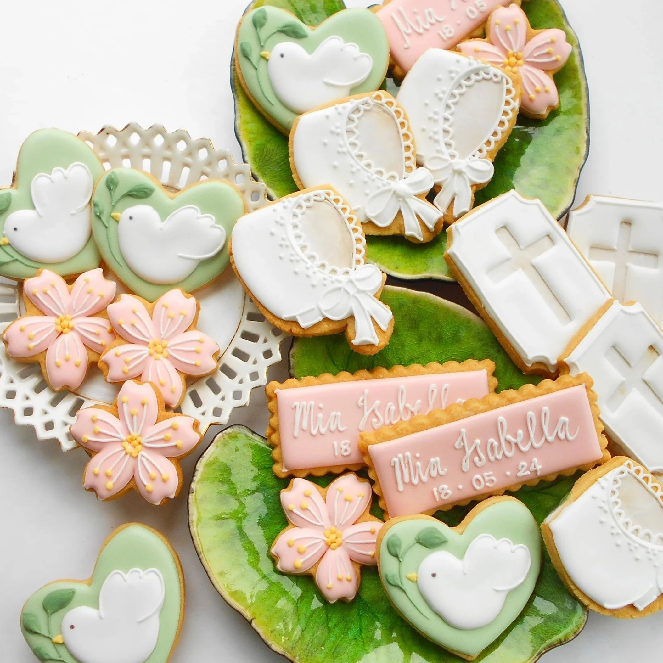 Baptism biscuits for Mia Isabella by TAKE THE BISCUIT UK