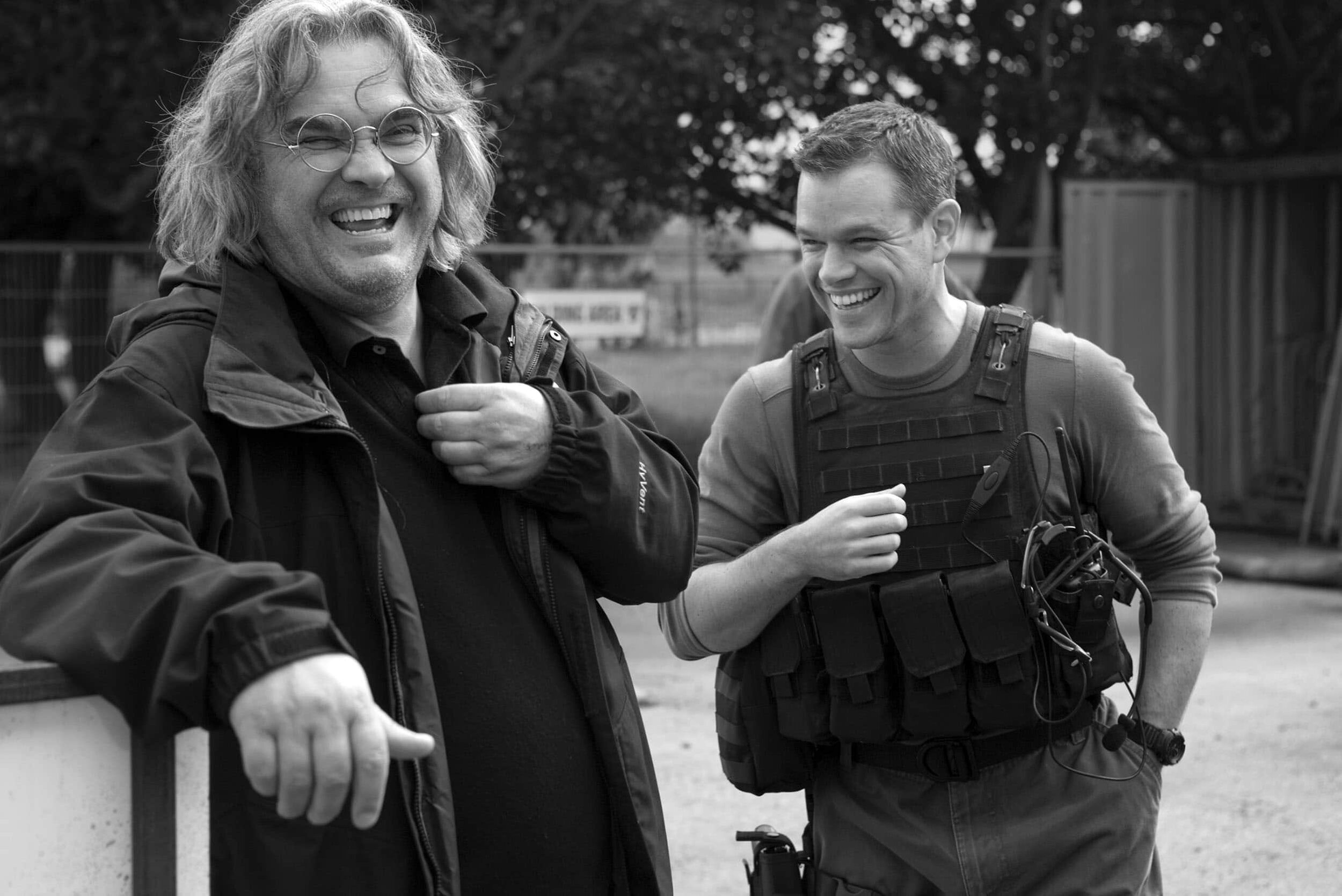 paul-greengrass-director-matt-damon-american-actor-british-green-zone-behind-the-scenes-laughter-on-set-director-jonathan-olley-unit-still-movie-photography.jpg