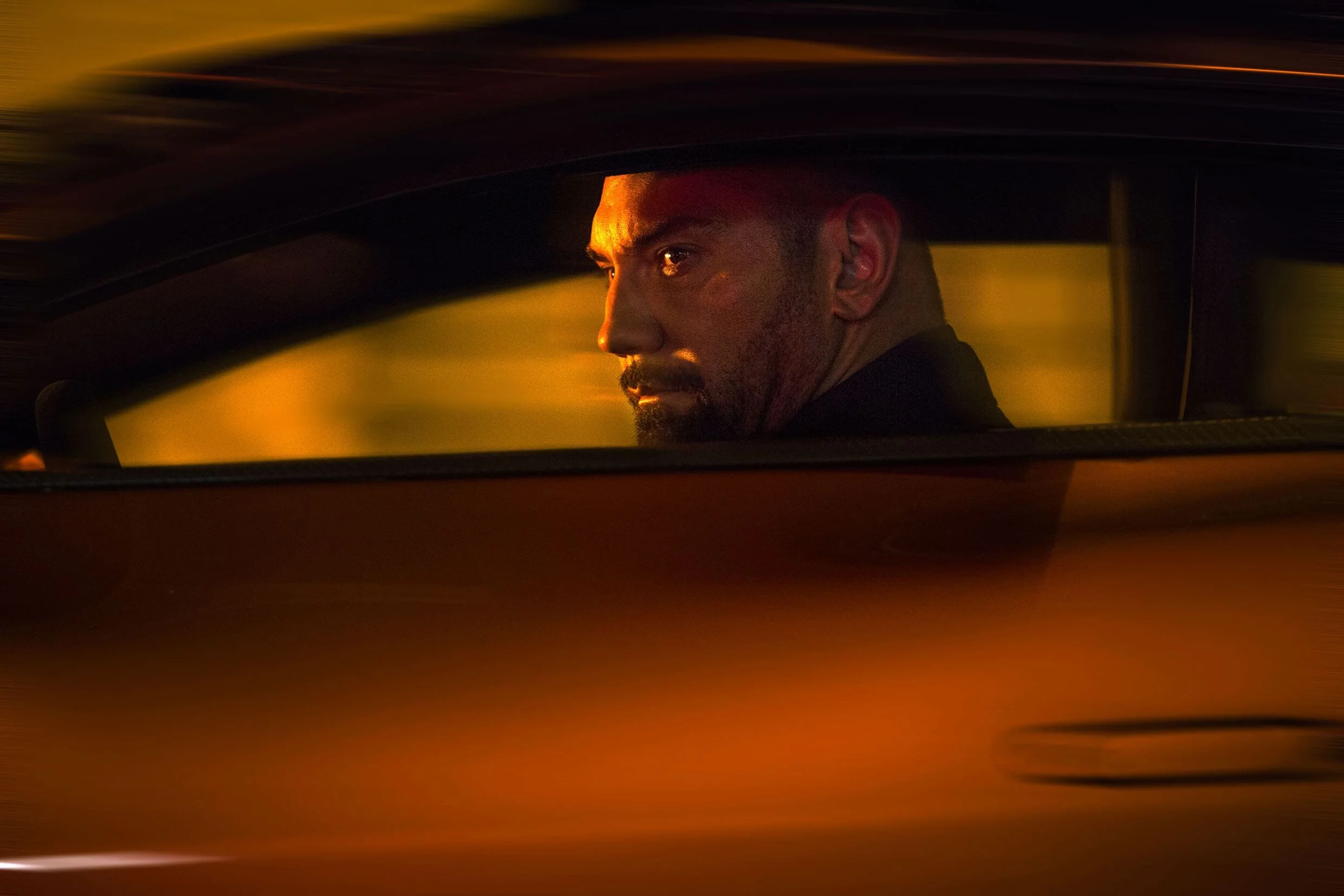 dave-david-bautista-mr-hinx-henchman-killer-james-bond-baddy-rome-italy-sam-mendes-director-jonathan-olley-unit-movie-film-still-photography-driving.jpg