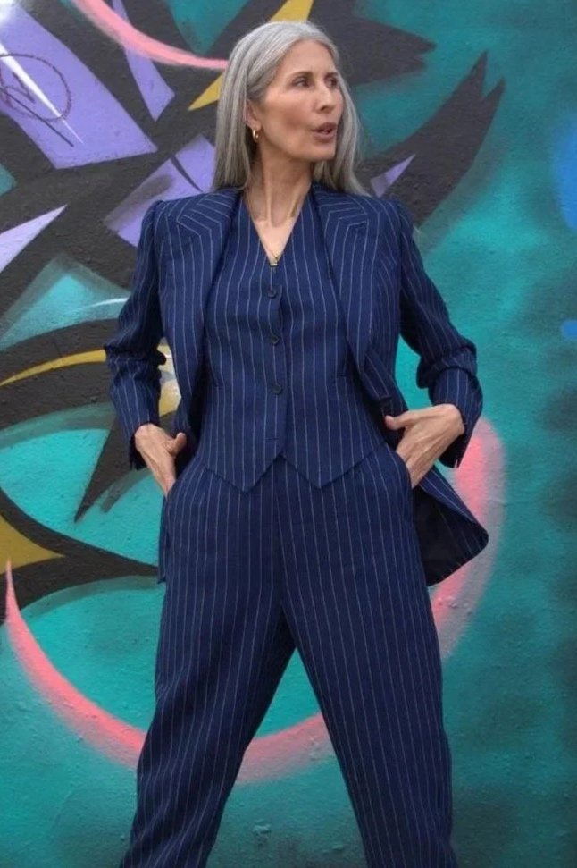 Blue chalkstripe three piece suit.