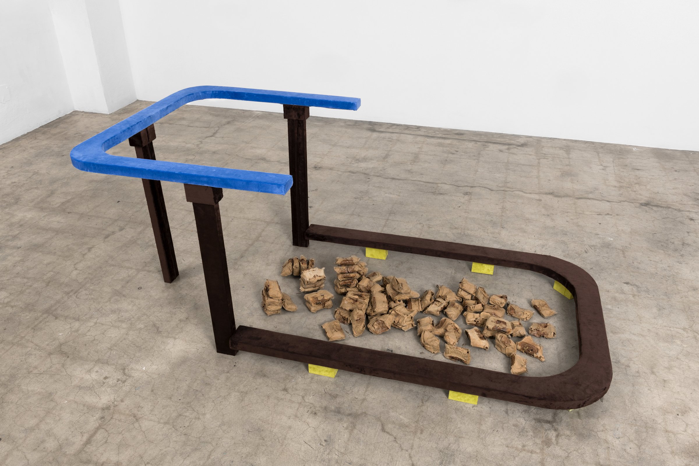 Fragility, 2025,
Plywood, ultrasuede, synthetic fur, diapers, and clay,
41 × 87 × 34 in. (top) × 4 3/4 in.
(104.1 cm x 221 cm x 86.4 cm (top) x 12.07 cm (low))