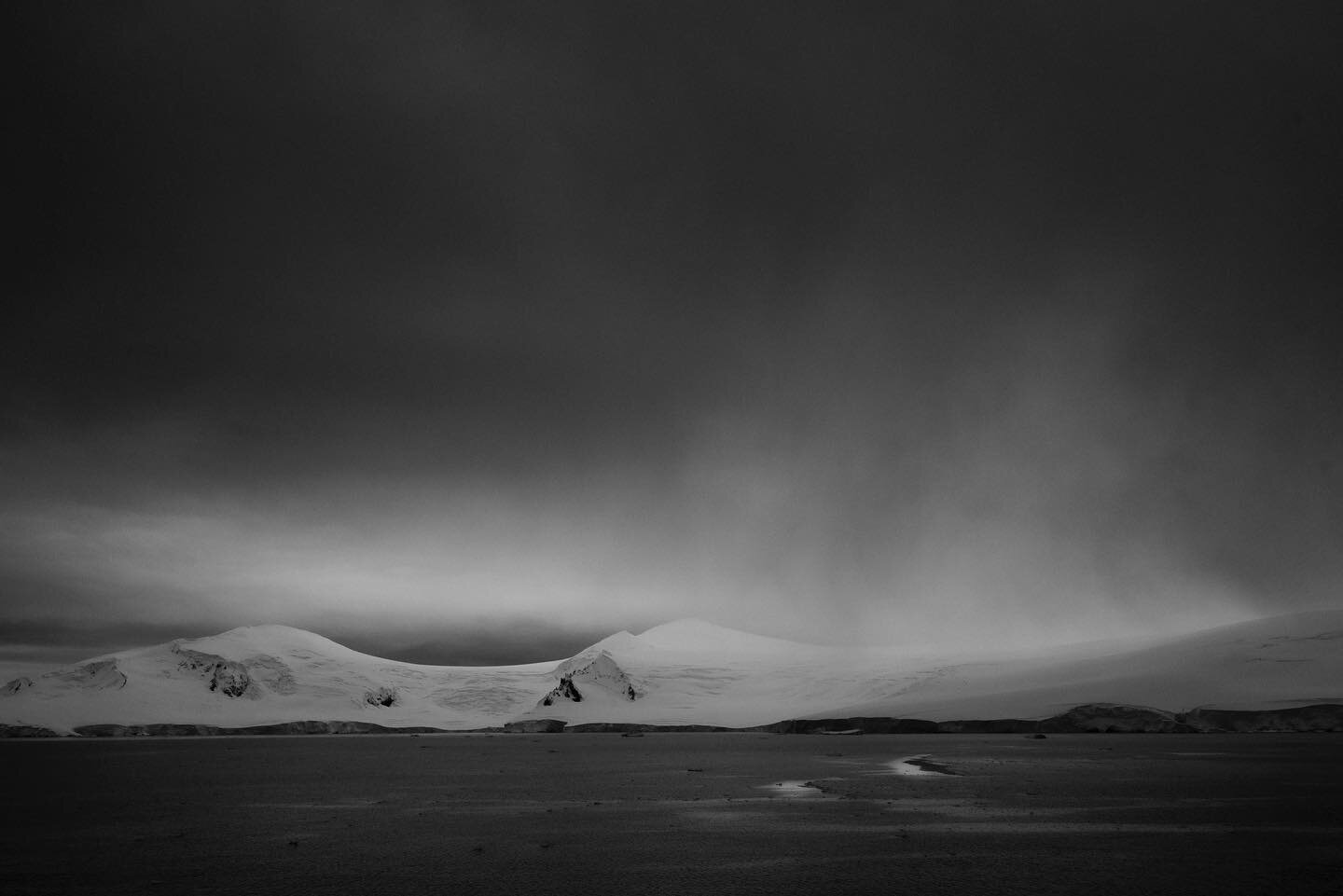 Snowghosts. Ethereal light over the Antarctic peninsula #antarctica #hurtigruten #blackandwhitephotography #landscapephotography