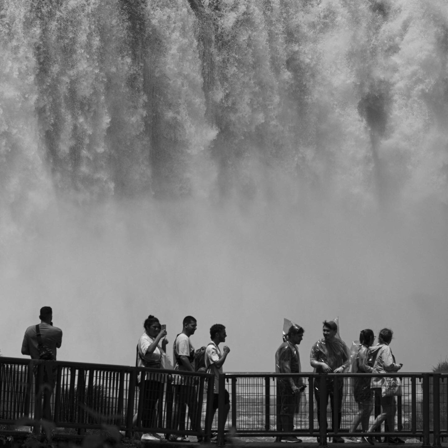 Two cone heads visiting Iguazo falls- wet wet wet!! #iguazufalls #waterfalls #blackandwhitephotography #travel