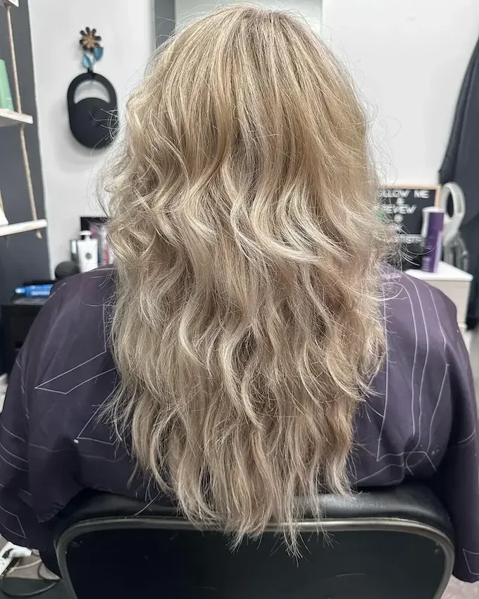 Platinum Full Highlight on a Wavy Textured Shag Haircut