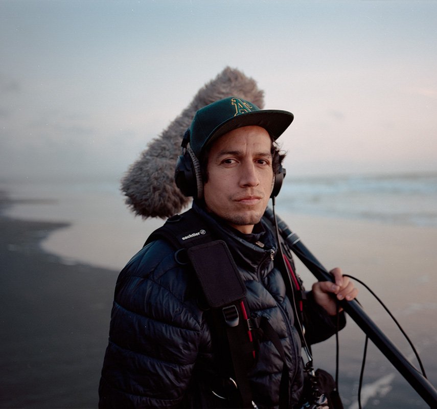 sound recordist with boom