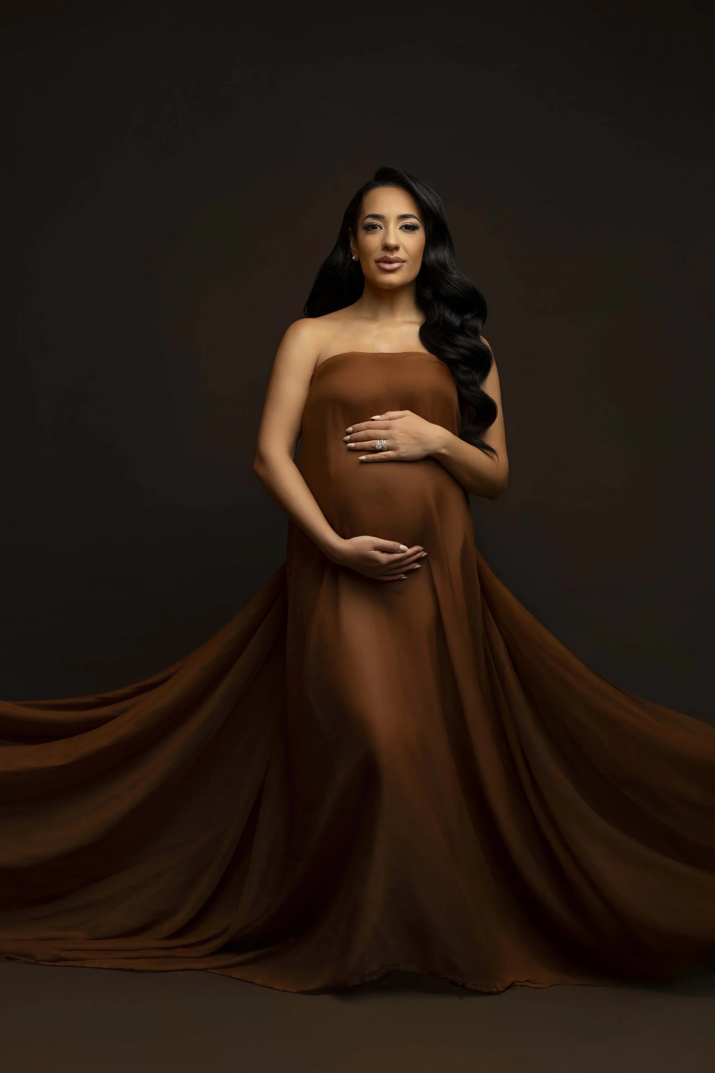 maternity photo in brown silks