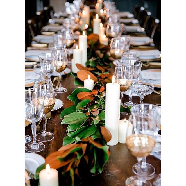 I loved putting this magnolia leaf garland as a simple centerpiece for our dinner table.  #dinnerparty #tablescape #tabledecor #interiors #dinnertable #magnolia #magnolialeaf #gatherings #hannahhudsonphotography