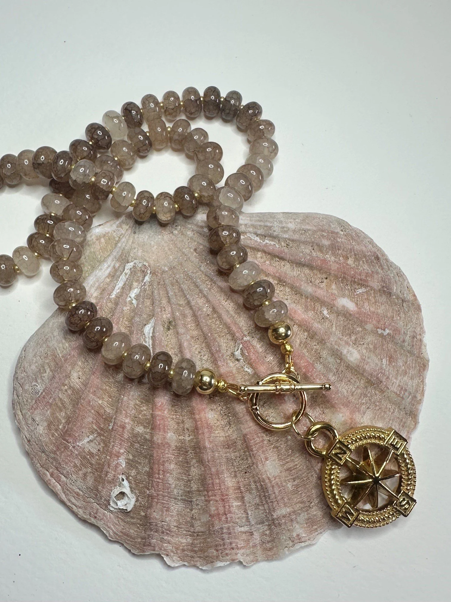 beige beaded gold compass necklace.jpg