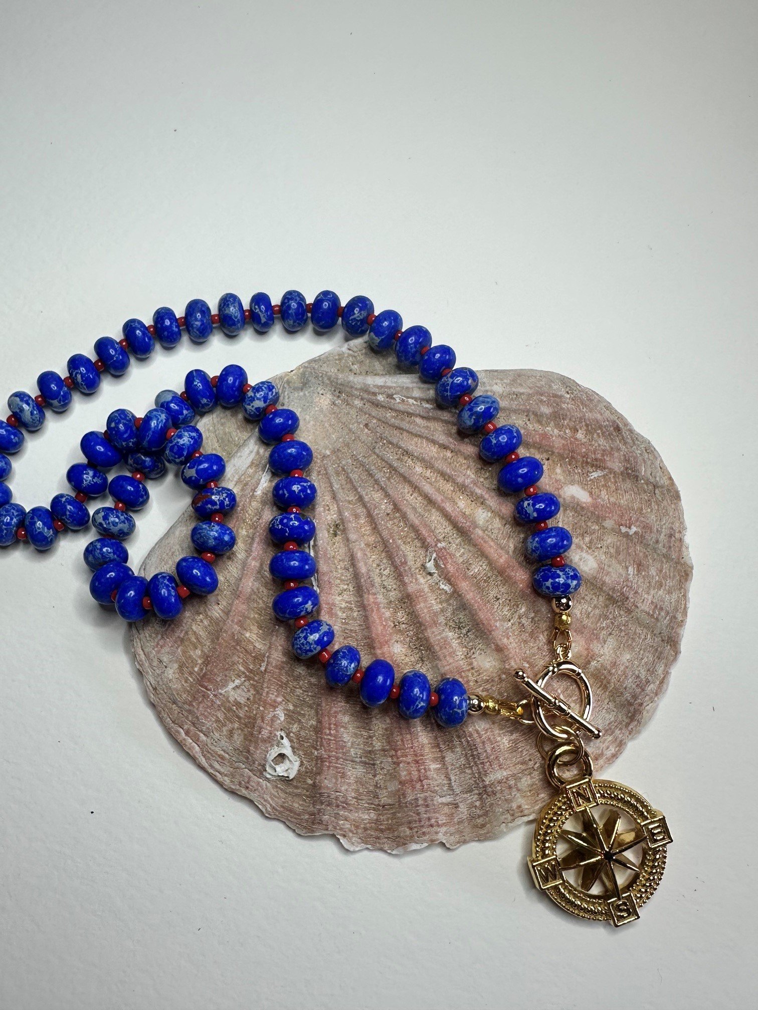 gold compass beaded necklace