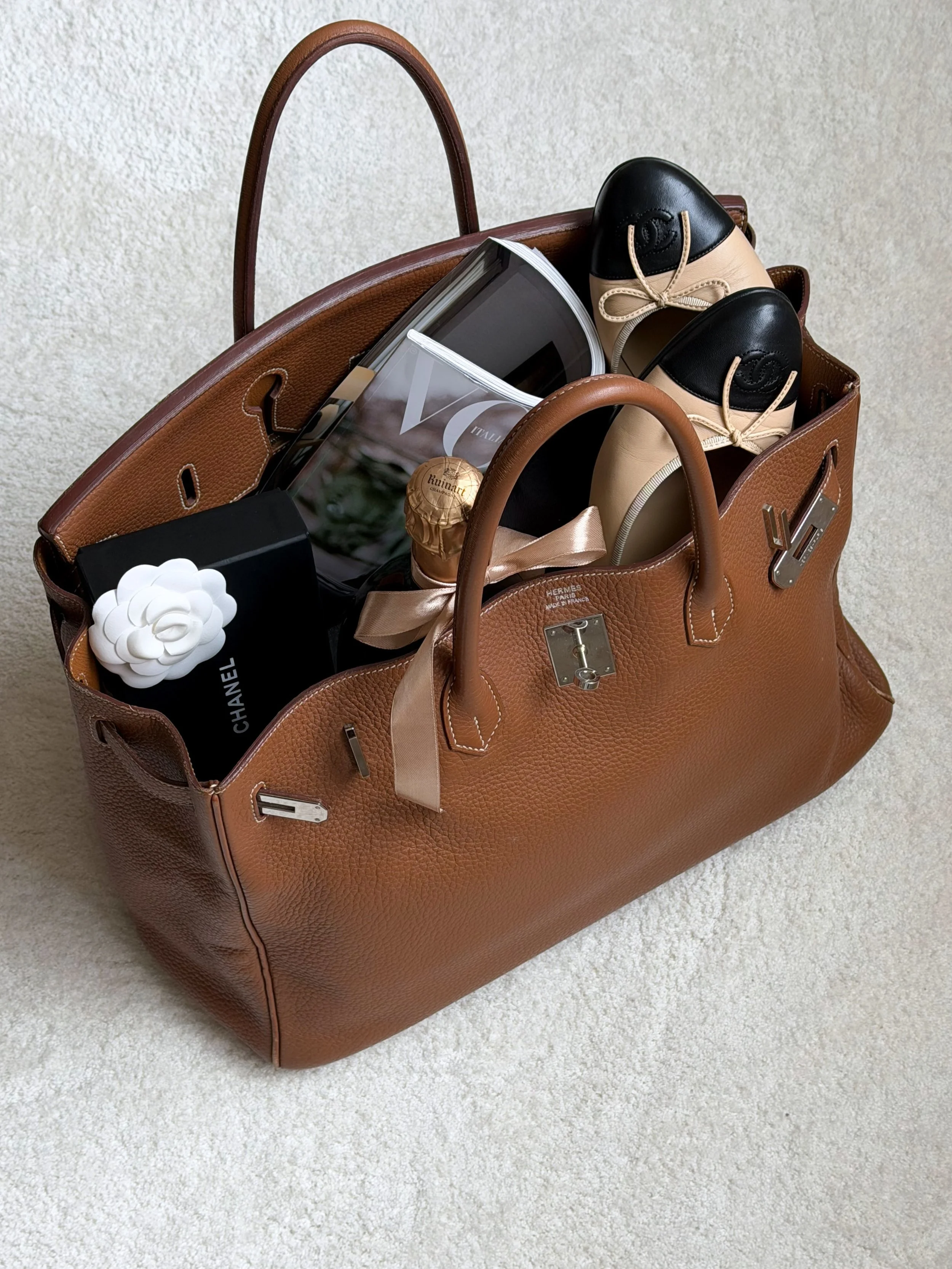 🍾🤎👜